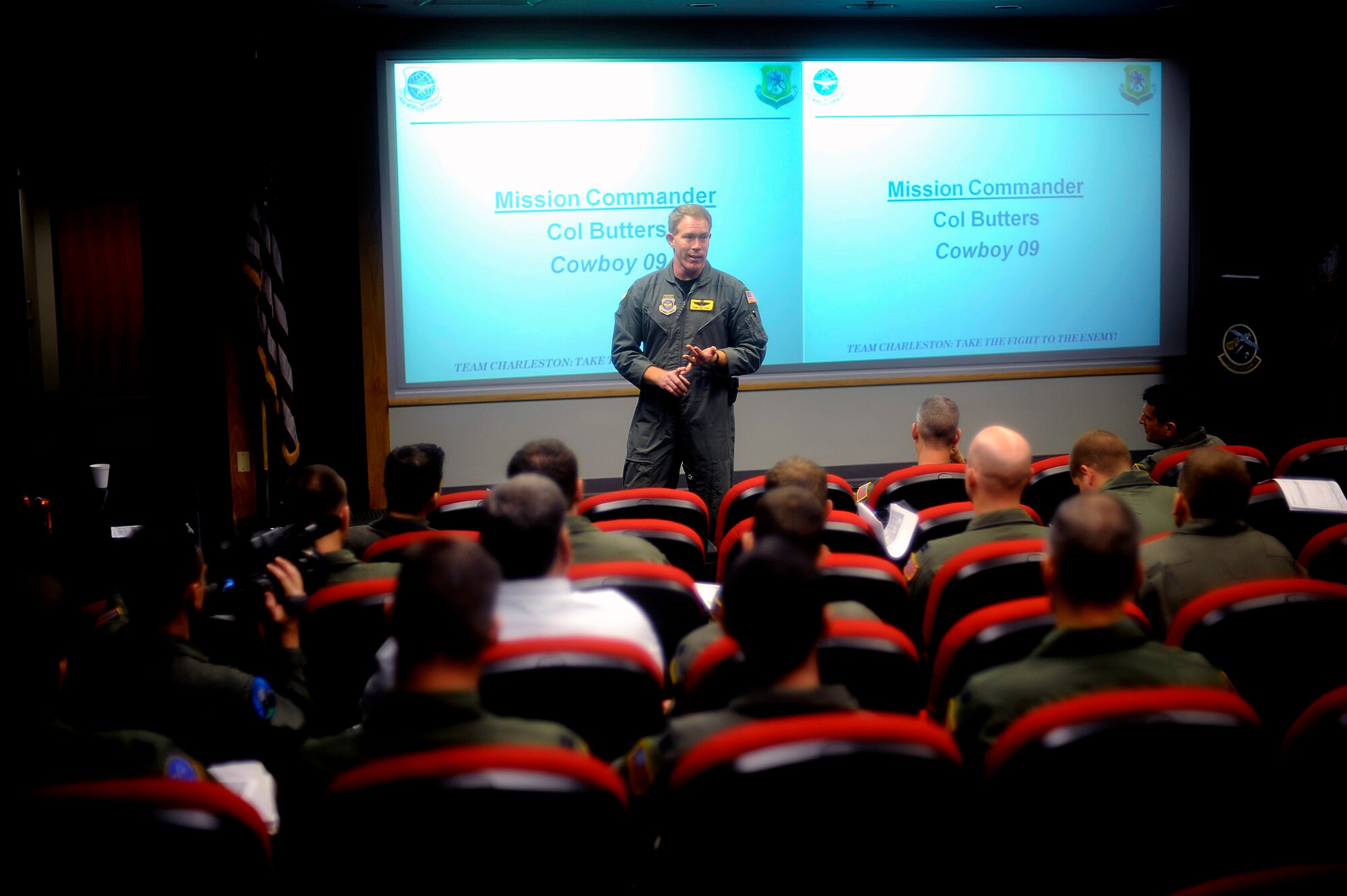 Col. Anthony Butters briefs pilots and aircrew from the 437th and 315th airlift wings before stepping to their planes for a strategic brigade airdrop exercise involving a 13-ship formation Dec. 18 from Charleston Air Force Base, S.C. C-17 Globemaster III transporters must be able to meet the Army's goal of airdropping a brigade's worth of troops and equipment (about 3,250 Soldiers and 3,450 tons of equipment). Colonel Butters is the C-17 mission commander. (U.S. Air Force photo/Tech. Sgt. Jeremy Lock)