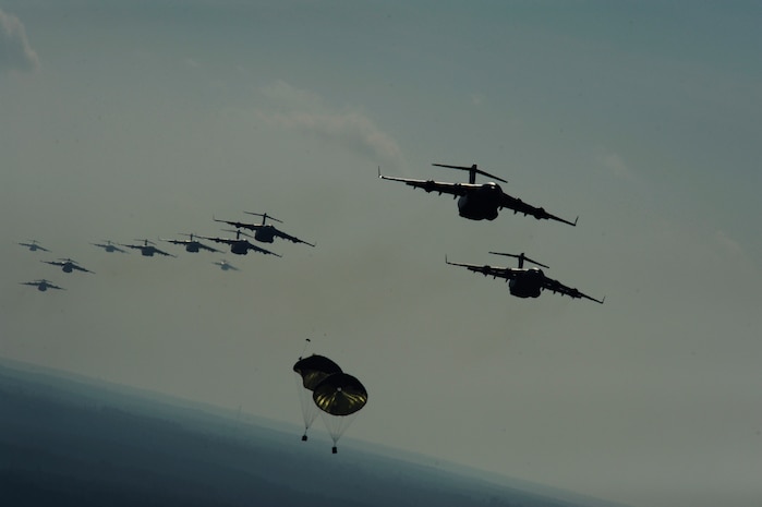 A Formation of U.S. Air Force C-17 Globemaster III's from the 437th Airlift Wing airdrop cargo to North Field, S.C., December 18th, 2008.  The 437th Airlift Wing conducted a large formation exercise utilizing 13 C-17 Globemaster III aircraft.  The aim of the exercise is to maintain the ability of the Air Force to drop the equivalent of an Army Brigade within 30 minutes.  (U.S. Air Force photo by Staff Sgt. James L. Harper Jr.)Released