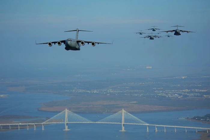 A Formation of U.S. Air Force C-17 Globemaster III's from the 437th Airlift Wing fly over the Ravenel Bridge in Charleston S.C., December 18th, 2008.  The 437th Airlift Wing conducted a large formation exercise utilizing 13 C-17 Globemaster III aircraft.  The aim of the exercise is to maintain the ability of the Air Force to drop the equivalent of an Army Brigade within 30 minutes.  (U.S. Air Force photo by Staff Sgt. James L. Harper Jr.)Released
