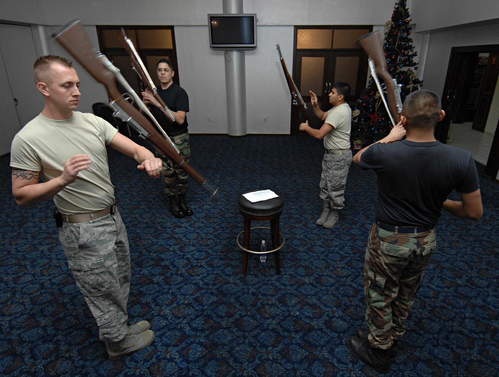 The Incirlik Drill Team rehearses a synchronized routine that will be performed during the 39th Air Base Wing Annual Awards Banquet. The drill team is comprised of four dedicated members from the base honor guard.(U.S. Air Force photo by Senior Airman Benjamin Wilson)