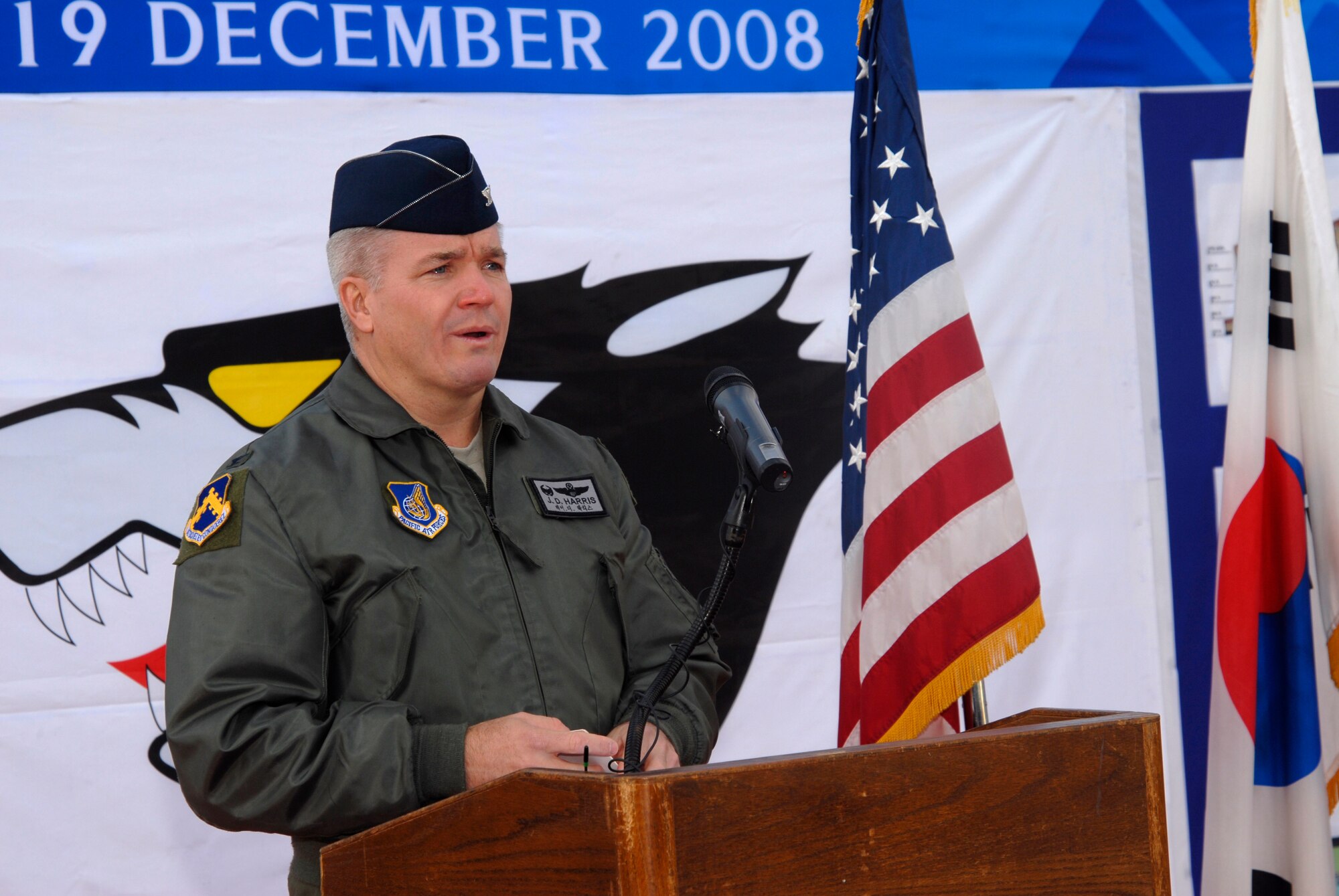 Colonel J.D. "Wolf" Harris Jr. speaks to the crowd gathered during a ground breaking ceremony for a new dormitory at Kunsan Air Base, Dec. 19, 2008. (U.S. Air Force Photo by SSgt Jason Colbert)