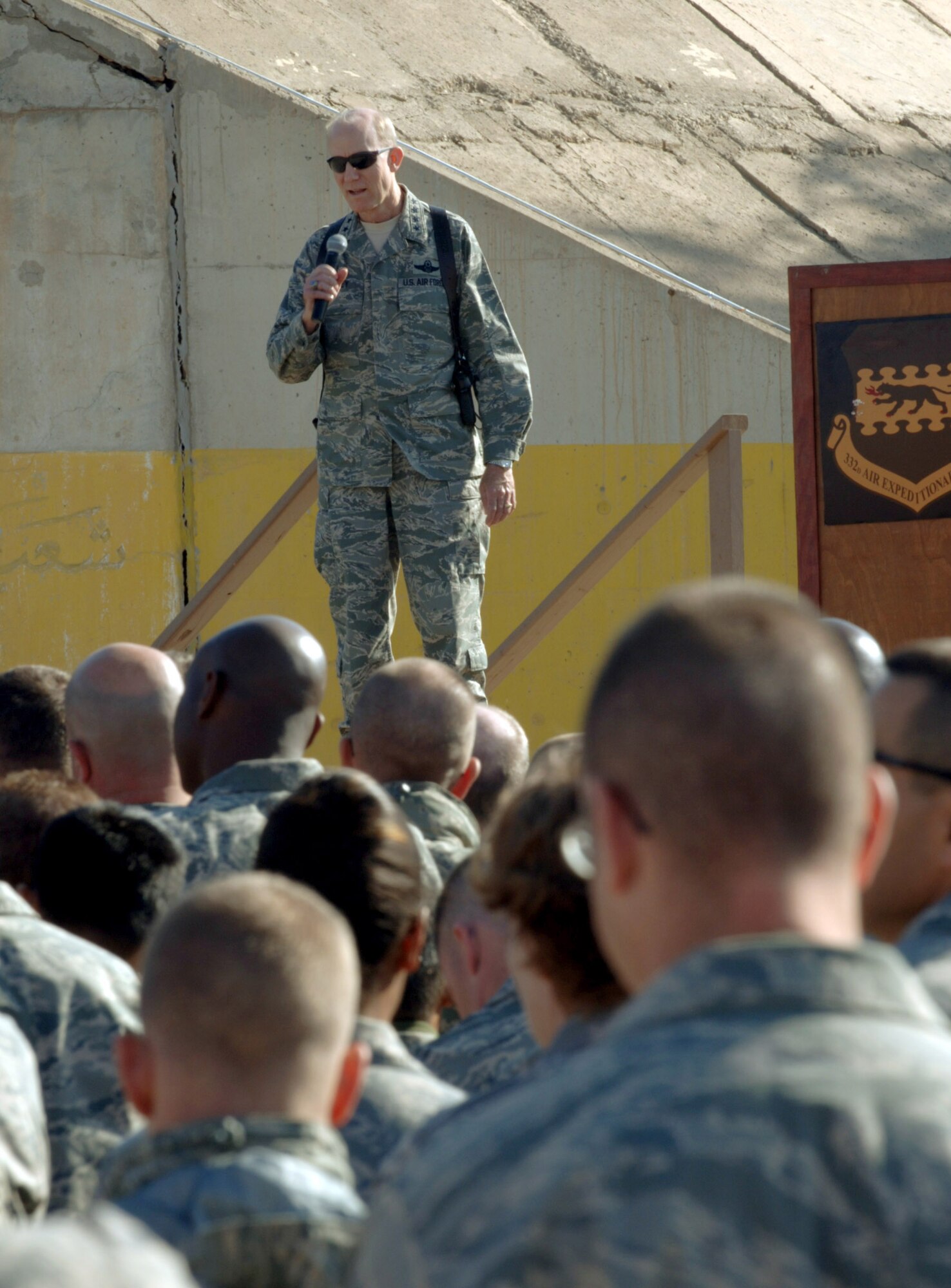 Gen. John Corley, commander of Air Combat Command, speaks to 332nd Air Expeditionary Wing Airmen during an Airman's Call at Joint Base Balad, Iraq, Dec. 3. Corley and leaders from ACC's A-staff visited the base to thank Airmen for their service and to determine how ACC can better organize, train and equip airmen deploying to the US CENTCOM AOR. (U.S. Air Force photo/Tech. Sgt. Erik Gudmundson)