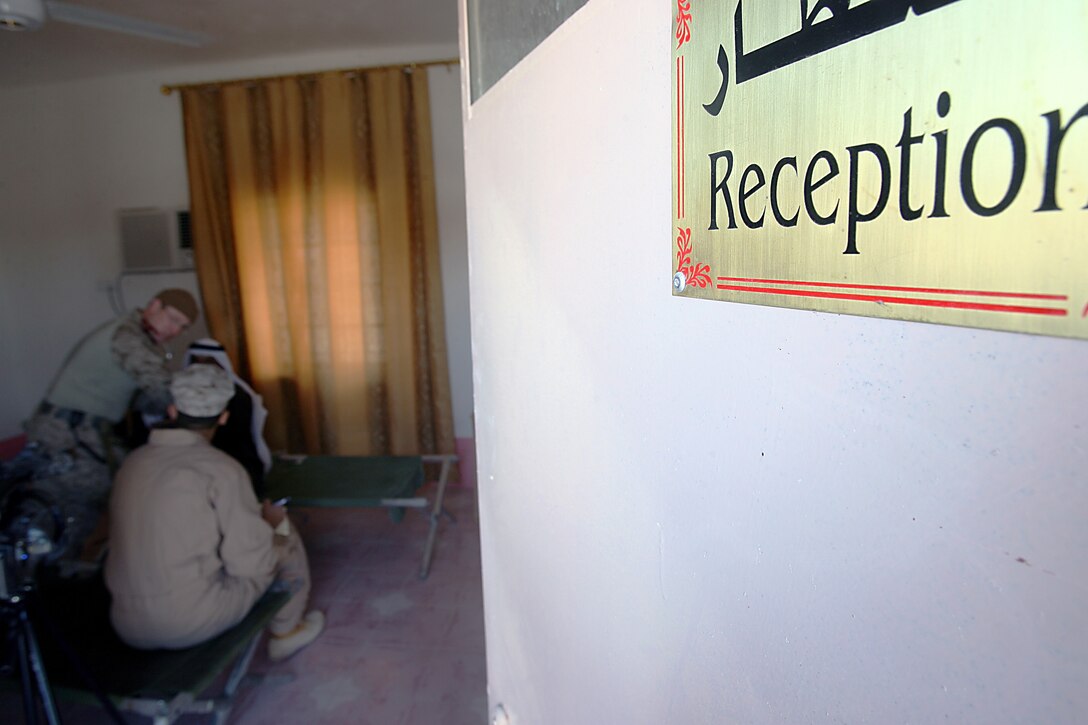 Iraqis see a doctor for treatment here in the new medical clinic Dec 20. The new Kabani Medical Clinic provides a venue for future medical engagements and Iraqi doctors to use to treat Kabani?s population. Kabani, a small village just east of Camp Taqaddum, used to host civil affairs engagements and visits from their own Iraqi medical practitioners in whatever structures they had available. Through a combination of diplomatic action from Iraqi and Coalition Forces, the village now has a necessary venue for health care. The combined medical engagement was one of many 1st MLG has performed since taking over for 2nd MLG in February of this year. The new clinic in Kabani marks the first of many recent steps toward improvements of Iraqi infrastructure.