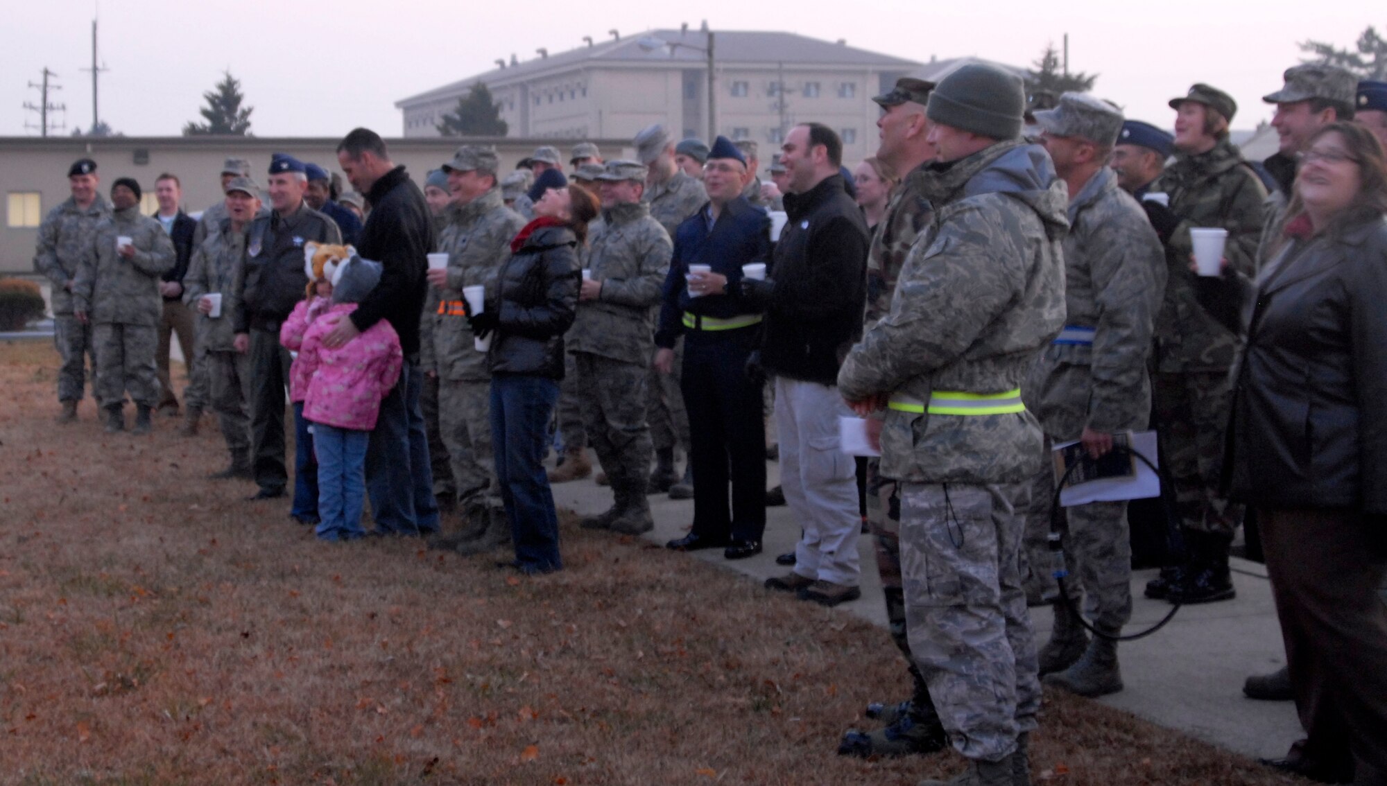 KUNSAN AIR BASE, Republic of Korea - Members of the 8th Fighter Wing gather for the annual Christmas tree lighting ceremony at Kunsan Air Base, Republic of Korea Dec. 15. (U.S. Air Force photo by: Senior Airman Dana Hill)