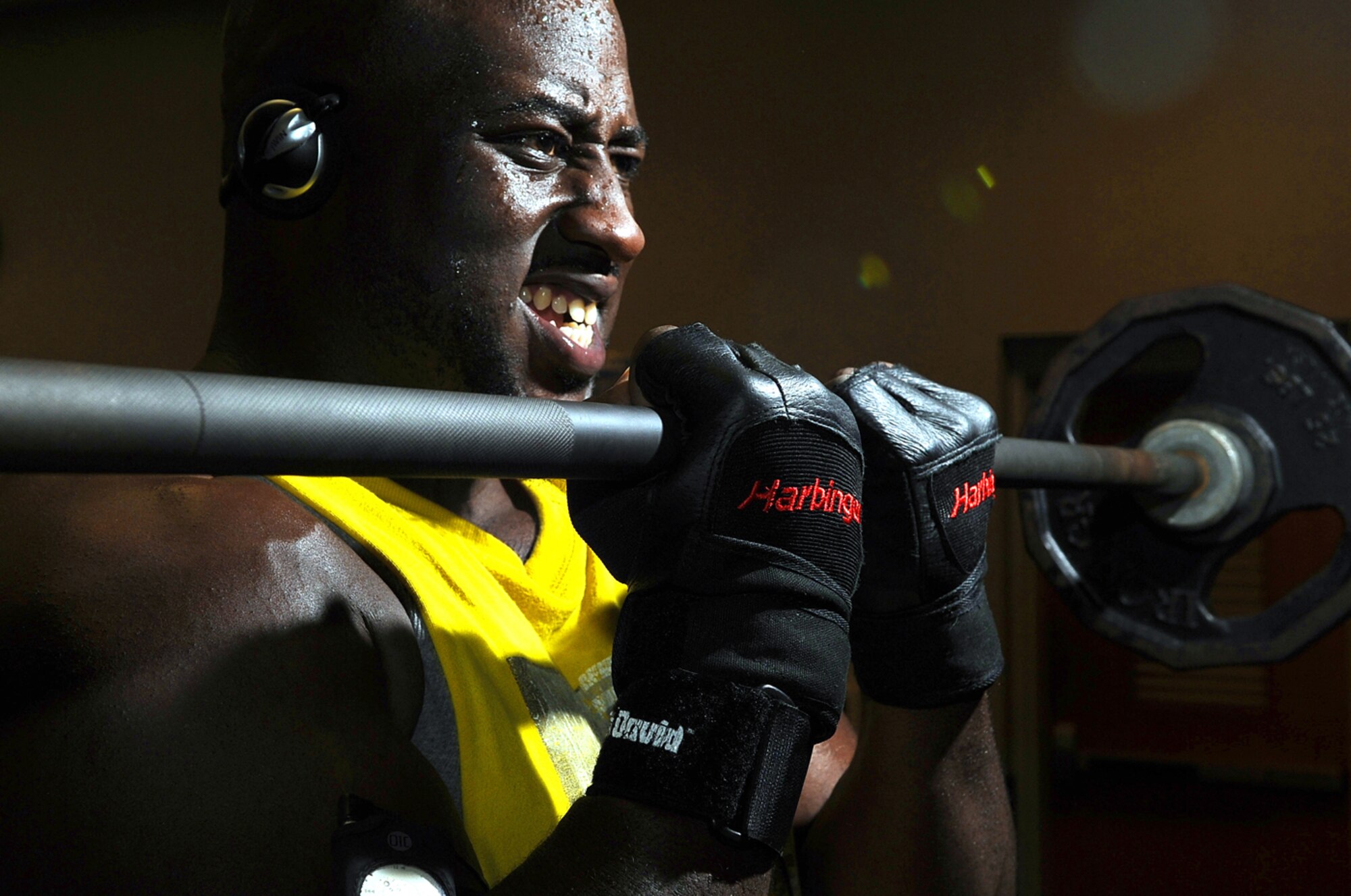 As part of his workout regimen. Dominick Ward lifts weights a half hour every day, five days a week at the fitness center on Charleston AFB, S.C. Along with a daily two-mile run, this exercise routine has led to his dramatic weight loss of 120 pounds... and counting! (U.S. Air Force photo by Staff Sgt. Angelita Lawrence)