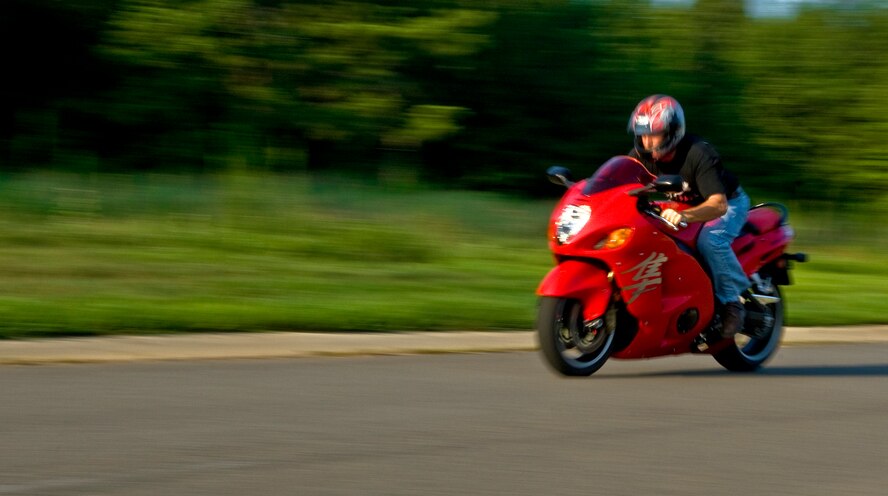 A motorcycle ride that exceeded 140 mph ended with a technical sergeant and a group of his friends behind bars, but in hindsight, the Airman says his incarnation probably saved his life. (U.S. Air Force Photo by Tech. Sgt. Matthew Hannen)