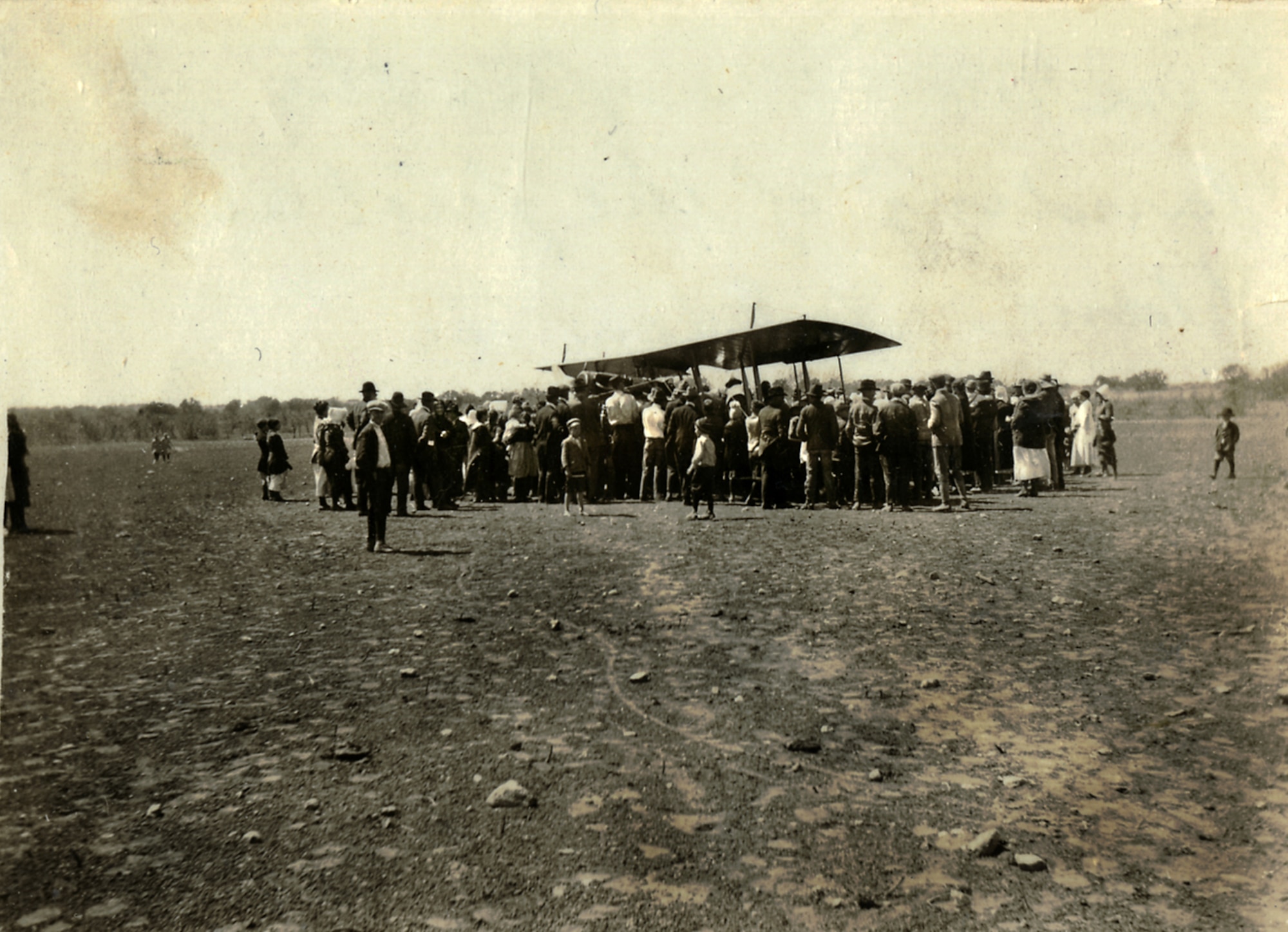 A crowd gathers around a JN-4D "Jenny," the first aircraft to touch down in Eden, Texas, March 25, 1919. (Courtesy of Angelo State University)
