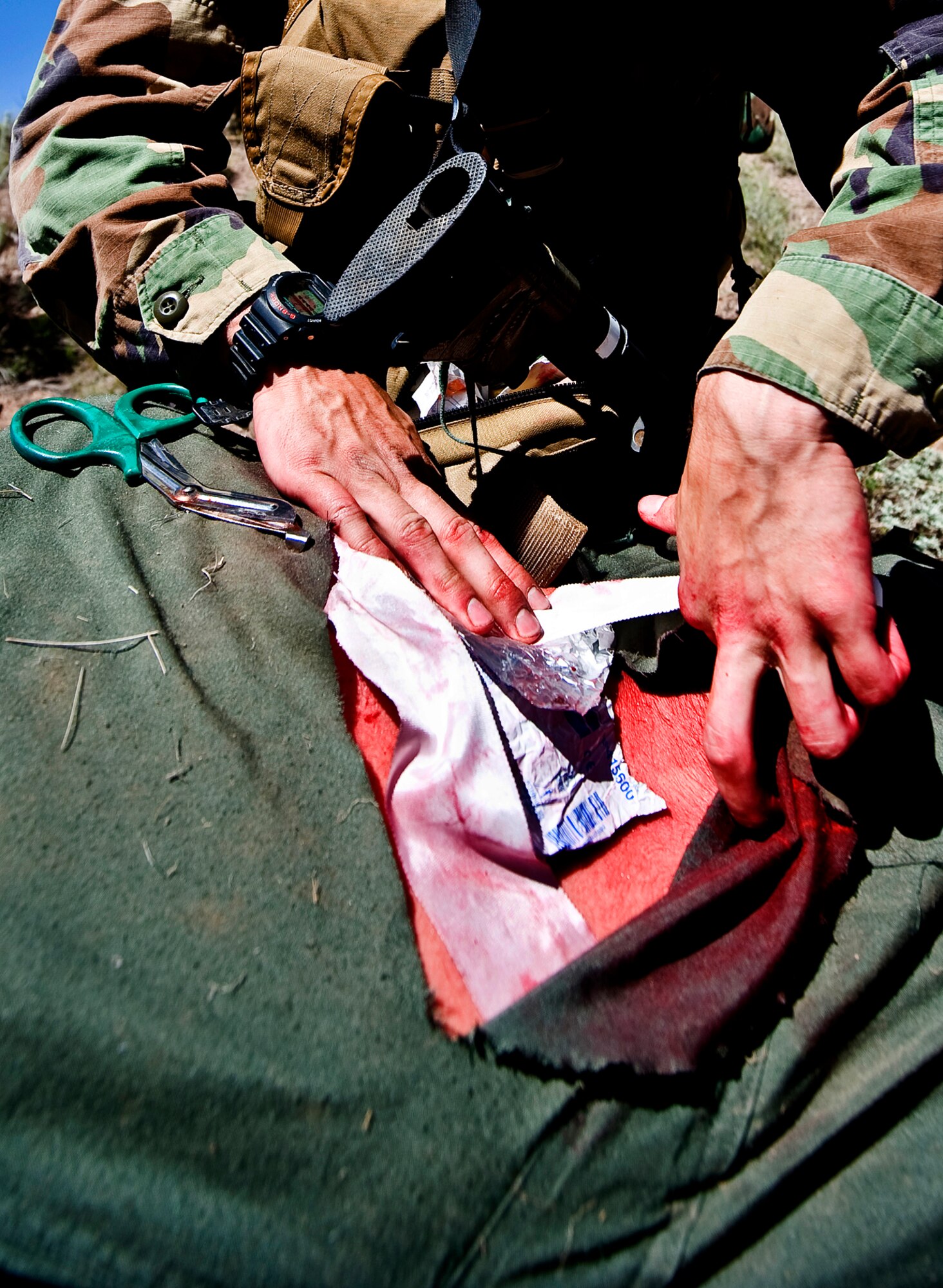 Students treat a wounded. (U.S Air Force Photo by Tech Sgt. Matthew Hannen)