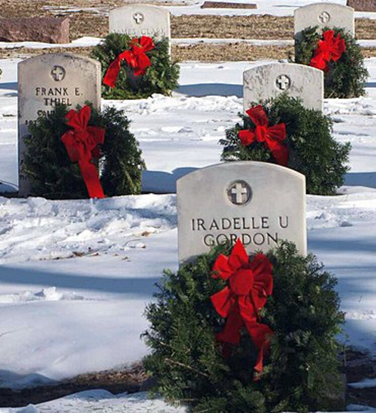 Enid Daughters of the American Revolution and Garfield County Veterans Council joined Wreaths Across America, a national organization with the goal of one day placing wreaths on the graves of every fallen soldier in the nation. (Photo by Elaine W. Johns)