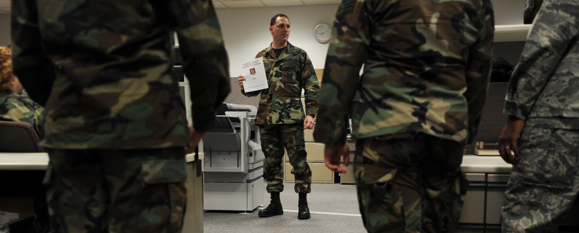Master Sgt. Ed Woolson briefs members of the 931st Military Personnel Flight about the new Key Family Member Program. Sergeant Woolson is the chief of family readiness for the 931st Air Refueling Group, an Air Force Reserve unit at McConnell Air Force Base, Kan. (U.S. Air Force photo/Tech. Sgt. Jason Schaap)