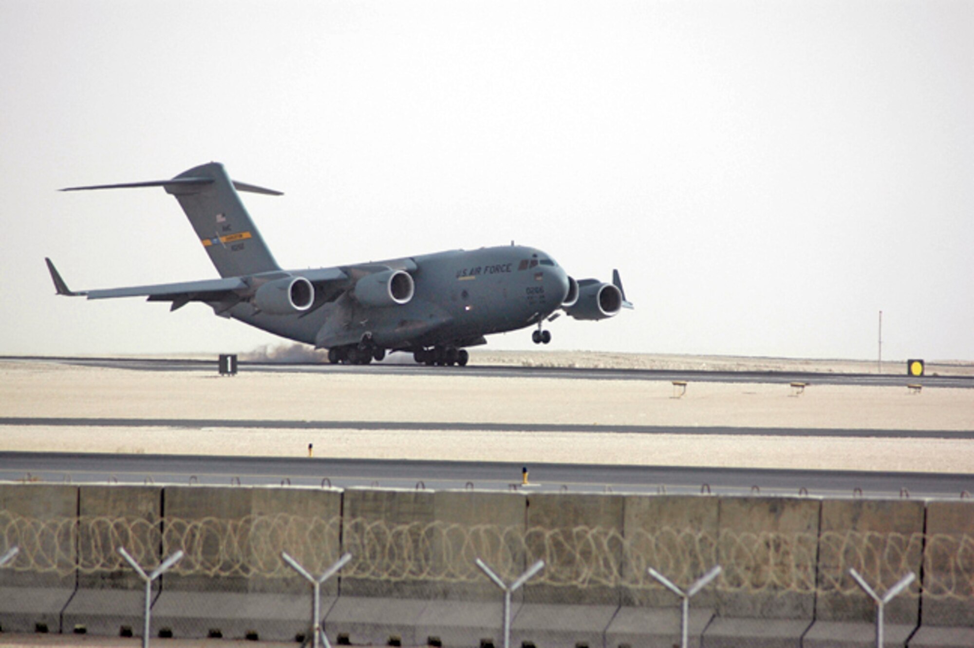 A C-17 Globemaster III, like this one, performs tactical airlift and airdrop missions, transports passengers, delivers troop resupply and all types of cargo throughout Southwest Asia in support of Operations Enduring and Iraqi Freedom. (U.S. Air Force photo/Senior Airman Clark Staehle)

