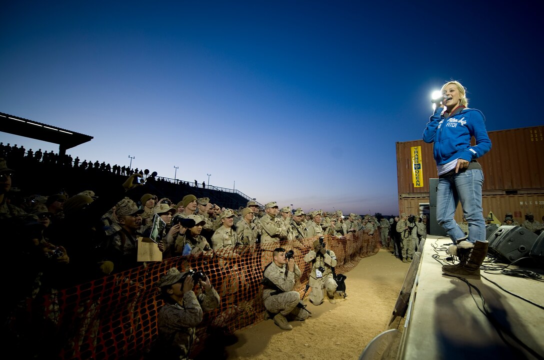 American Idol contestant and country musician Kellie Pickler entertains Marines and sailors stationed at Al Asad Air Base, Iraq, Dec. 19, 2008.