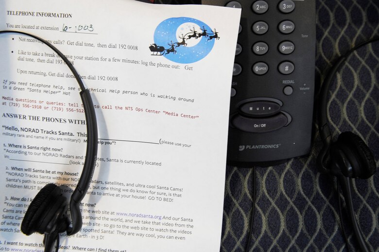 Caller instructions are taped to phones at the North American Aerospace Defense Command Tracks Santa Operations Center Dec. 22 at Peterson Air Force Base, Colo. (U.S. Air Force photo/Staff Sgt. Desiree N. Palacios) 