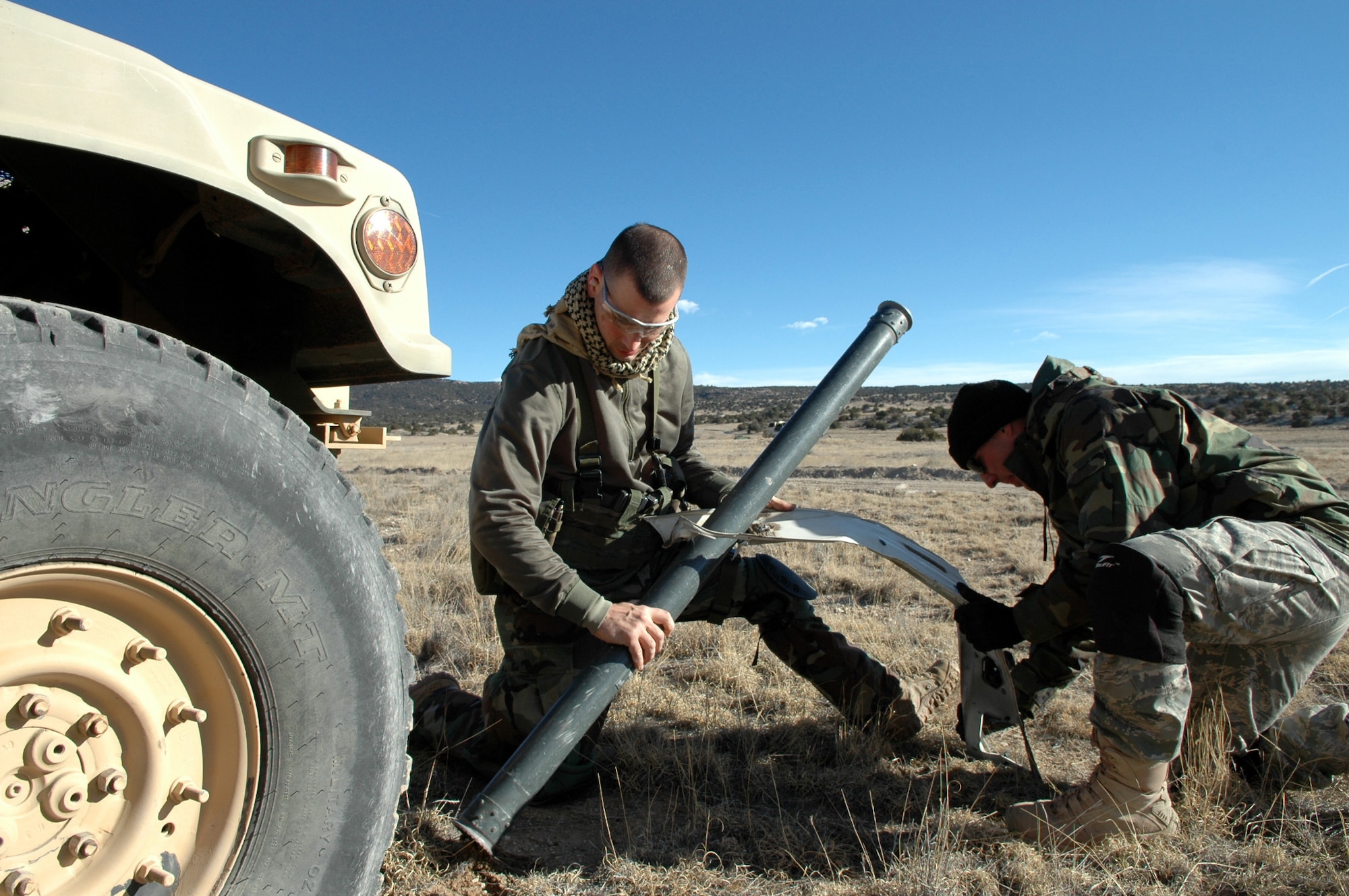 Joint Terminal Attack Controllers act as opposing forces while they simulate a ground missile attack against their co-workers with Barksdale A-10s while deployed to Peterson AFB, Colo., in mid December. The JTACs received training for deployment in support of OEF/OIF. U.S. Air Force Photo/Tech. Sgt. Andre Menard