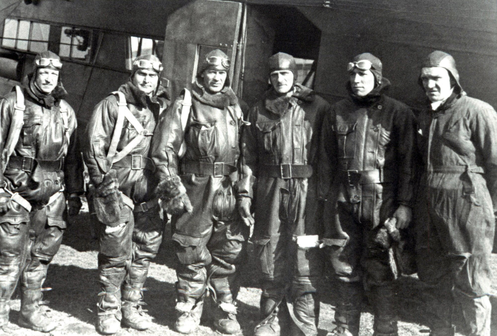 Pictured is the crew of the "Question Mark," including, from left to right, Lieutenant Harry Halvorsen, Capt. Ira Eaker, Staff Sgt. Roy Hooe, Maj. Carl Spaatz (mission commander), Lt. Elwood "Pete" Quesada, and an unidentified crewmember. During a 1929 refueling operation dubbed "Question Mark," a Fokker C-2A was refueled in flight by two modified Douglas C-1 transport aircraft.   (Courtesy photo)
