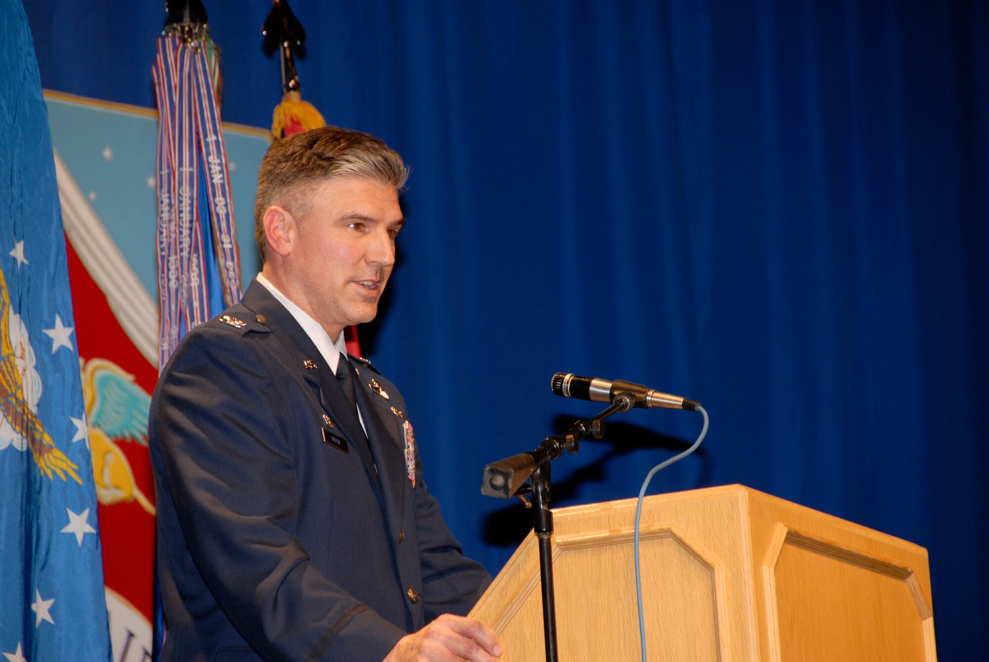 133rd Airlift Wing Commander, Col. Greg Haase, thanks each of the members during his holiday message to Airmen, families and friends of the 133rd Airlift Wing on Dec. 13, 2008 during the Wing Recognition Ceremony at the St. Paul Air National Guard base. (USAF photo by Tech. Sgt. Tyrell Heaton)