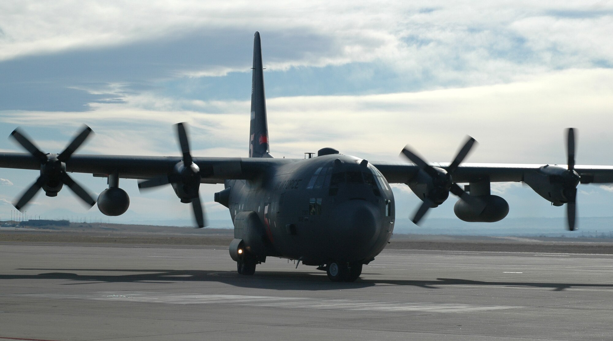 Col. James J. Muscatell, Jr., 302nd Airlift Wing commander, taxis his C-130H3 before ending his final flight with the wing Dec. 22, 2008, at Peterson Air Force Base, Colo. Colonel Muscatell performed his final flight before taking command of the 403rd AW at Keesler AFB, Miss., slated for mid-January 2009. Known as a "fine flight," a pilot is congratulated and recognized for their service to their squadron with a ceremonial gathering directly after the flight. (U.S. Air Force photo/Stephen J. Collier)