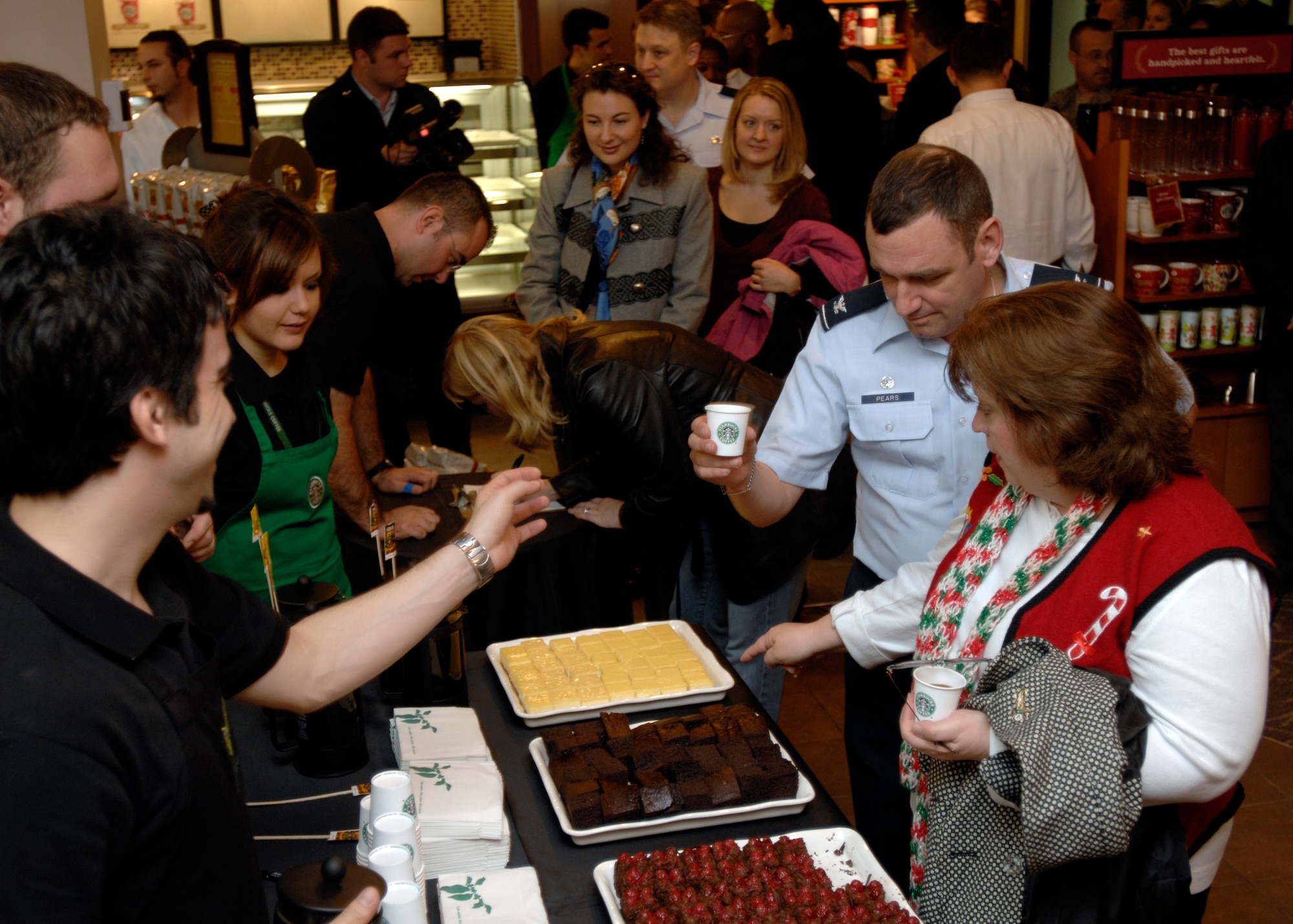 Certain Incirlik personnel sample desserts and coffee during the “soft opening” of the first Starbucks in United States Air Forces Europe Dec. 21. (U.S. Air Force photo by Master Sgt. Edward Holzapfel)