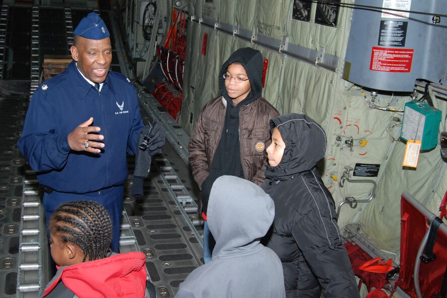 Lt. Col. Marshall Irvin, 94th Mission Support Group deputy commander, discusses the value of getting a good education with members of Boy Scout Troop 1827 in preparation to "having a cool job" in the Air Force.  (U.S. Air Force photo/Master Sgt. Stan Coleman)
