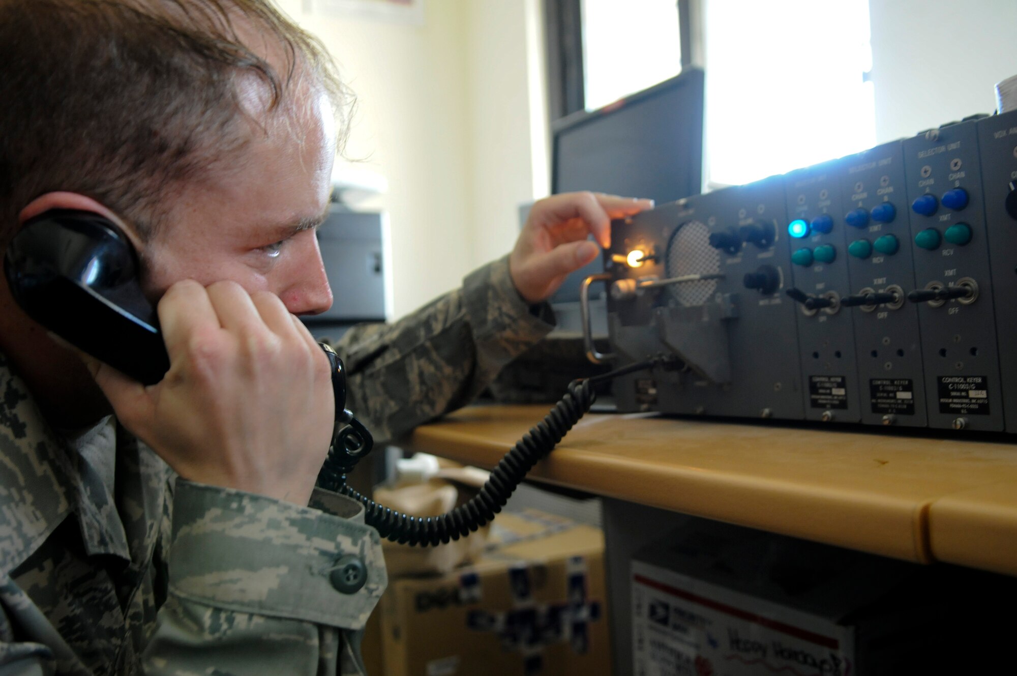 Senior Airman Evan Lawson, ground radio maintenance technician assigned to the 379th Expeditionary Communications Squadron, troubleshoots a radio transmitter in the Weather Operations office Dec. 17, 2008, at an undisclosed air base in Southwest Asia. The Communications Squadron provides command and control, communications and information services for U.S. and Coalition forces at the 379th Air Expeditionary Wing. Airman Lawson is a native of Lytle, Texas, and is deployed from Lackland Air Force Base, Texas, in Support of Operations Iraqi and Enduring Freedom and Joint Task Force-Horn of Africa.  (U.S. Air Force photo by Tech. Sgt. Michael Boquette)