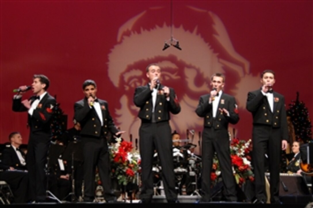 The "Sideboys," a vocal quintet that performs as part of the Navy's Sea Chanters Chorus, sing "It Must've been Ol' Santa Claus," Dec. 20, 2008, at DAR Constitution Hall as part of the annual Navy holiday concert series in Washington, D.C. Left to right are Navy Petty Officer 1st Class Adam Tyler, Petty Officer 1st Class Michael Belinkie, Petty Officer 1st Class Michael Webb, Petty Officer 1st Class William Edwards and Petty Officer 1st Class Benjamin Bransford.