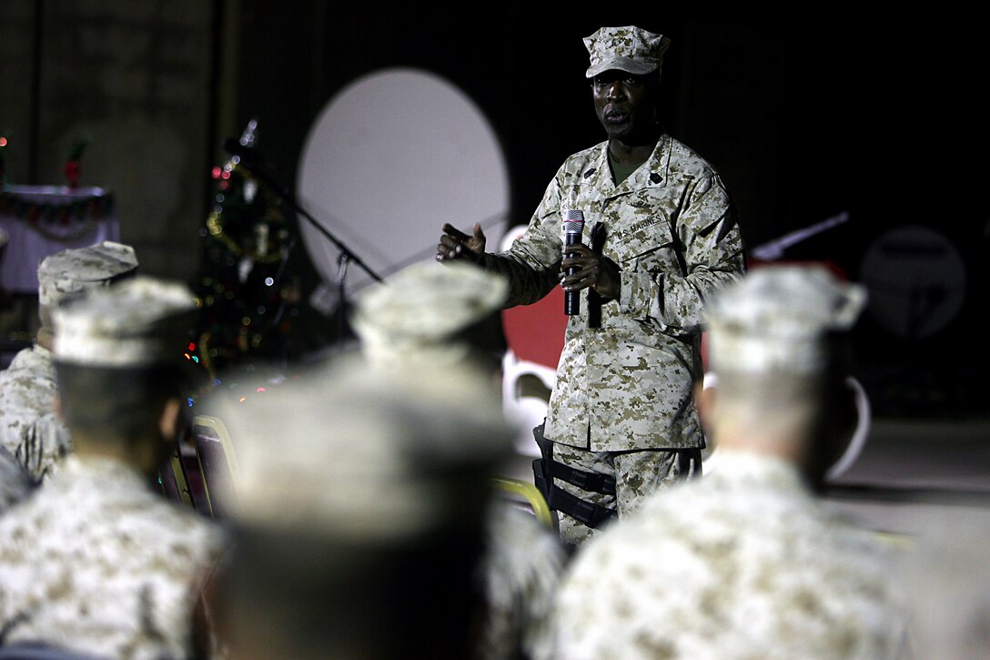 Sergeant Major Carlton W. Kent, Sergeant Major of the Marine Corps, speaks to Marines, Sailors and Soldiers during a ?town hall? meeting here Dec. 25. General James T. Conway, Commandant of the Marine Corps, and Kent talked about the growth of the Corps and the Corps? anticipated shift to Afghanistan.