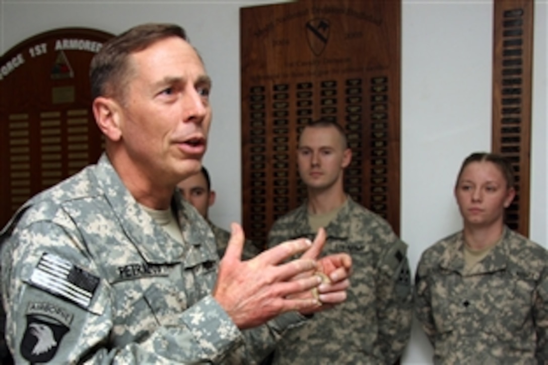 Army Gen. David Petraeus, commander of U.S. Central Command, speaks to soldiers from 4th Infantry Division, Multi-National Division-Baghdad, who have excelled in their fields at the division’s headquarters on Camp Liberty, Iraq, Dec. 25, 2008. 