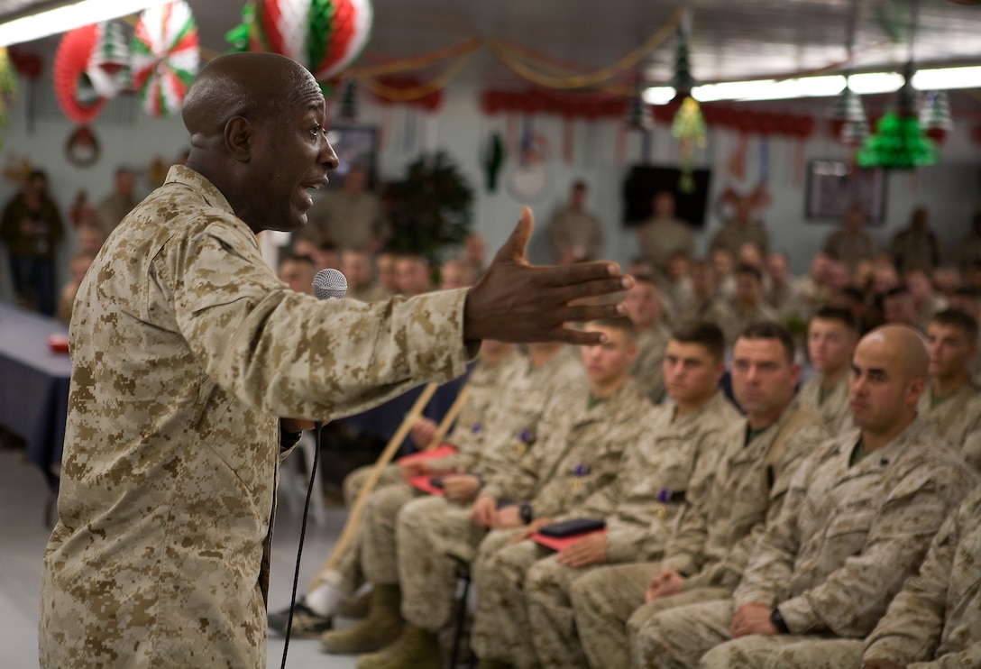 Sergeant Major of the Marine Corps, Sgt. Maj. Carlton Kent, speaks to Marines of Task Force 1st Battalion, 3rd Regiment, Regimental Combat Team 1, Friday, at the Dining Facility at Camp Baharia, Karmah, Iraq. The Commandant and Sergeant Major of the Marine Corps came to thank Marines for their work and sacrifices, especially during the holiday time. (Official U.S. Marine Corps Photo / Released)