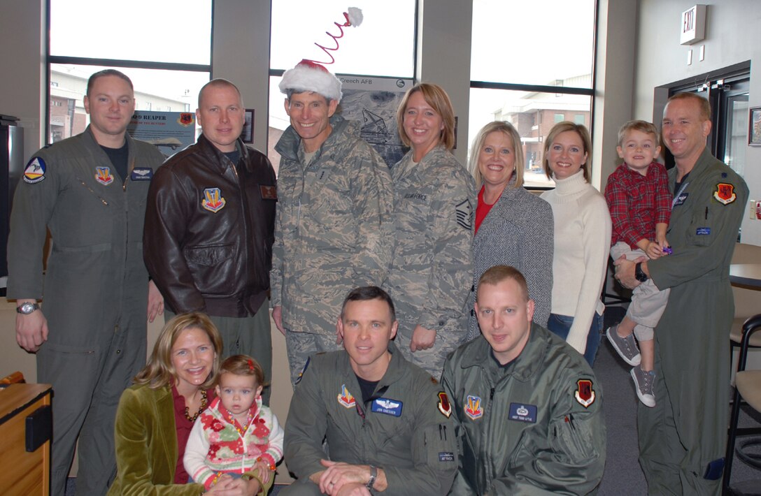 Airmen and family members of the 42nd Attack Squadron at Creech Air Force Base, Nev., spent lunch Christmas day with Gen. Norton Schwartz, Air Force chief of staff, and his wife, Suzie. While at the squadron, General Schwartz personally thanked the aircrews flying combat operations in support of ground troops in Afghanistan. (U.S. Air Force photo/Staff Sgt. Alice Moore)