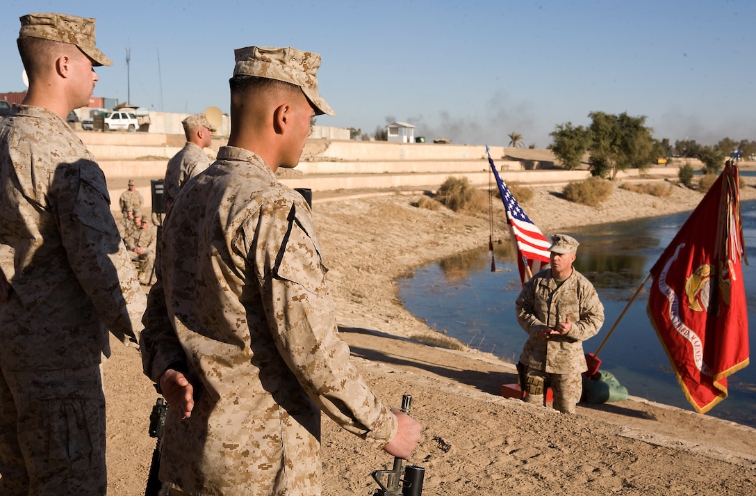 Lt. Col. Andrew Milburn, commanding officer, Task Force 1st Battalion, 3rd Marine Regiment, Regimental Combat Team 1, speaks to Marines during a memorial service for Lance Cpl. Thomas J. Reilly, Jr., Dec. 28. Reilly, a rifleman with C Company’s 2nd Platoon, from London, Ky., was killed in action during a patrol in Karmah, Iraq, Dec. 21.