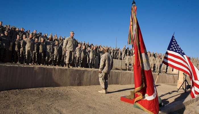 1st Sgt. Fredrick A. Smith, company first sergeant, C Company, Task Force 1st Battalion, 3rd Marine Regiment, Regimental Combat Team 1, conducts roll call during a memorial ceremony for Lance Cpl. Thomas J. Reilly, Jr., Dec. 28. Reilly, a rifleman with C Company’s 2nd Platoon, from London, Ky., was killed in action during a patrol in Karmah, Iraq, Dec. 21.