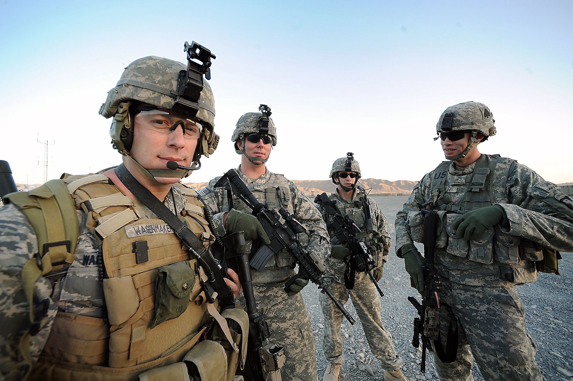 Tactical air control party Airman Tech. Sgt. Harvey Wagenmaker (from left), an air liaison officer with the 2nd Battalion, 506th Infantry Regiment, stands with Army Sgt. 1st Class James Strickland, Army Staff Sgt. Chris Summers and Army Sgt. 1st Class William Fallin, members of the 2-506th fire effects coordination cell. TACP Airmen serve as liaisons between Army ground commanders and pilots in the sky to eliminate an enemy's threat to ground forces. (U.S. Air Force photo/Staff Sgt. Aaron Allmon) 