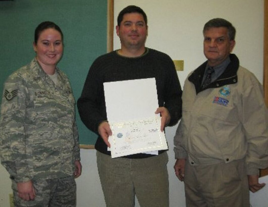 College Soccer Coach receives the Patriotic Employer Award --It's the championship game of the soccer season and the final game for Elms College Senior Shannon Donnelly. While executing outstanding footwork and team play, Ms. Donnelly scored her final college career goal. Her score became the winning goal and Elms College defeated Lesley College for the championship. When she is not playing soccer, Ms. Donnelly is a full time student, a part time manager for an indoor soccer facility and an EMT in Southern Vermont. If that is not enough, this busy athlete and scholar is also SSGT. Donnelly, United States Air Force Reserve serving with the 439th Aeromedical Staging Squadron assigned to Westover. Sergeant Donnelly nominated her coach and employer, Ryan Kelly, to receive the Patriotic Employer Award for his support of her Air Force duties. Area Chairman for Western Mass and Ombudsman Director Mr. Earl Bonett MAESGR was on hand to present the award with Ms. Donnelly to Coach Kelly.Left to right: SSGT Shannon Donnelly, Coach Ryan Kelly and MAESGR Ombudsman Director Mr. Earl Bonett.   