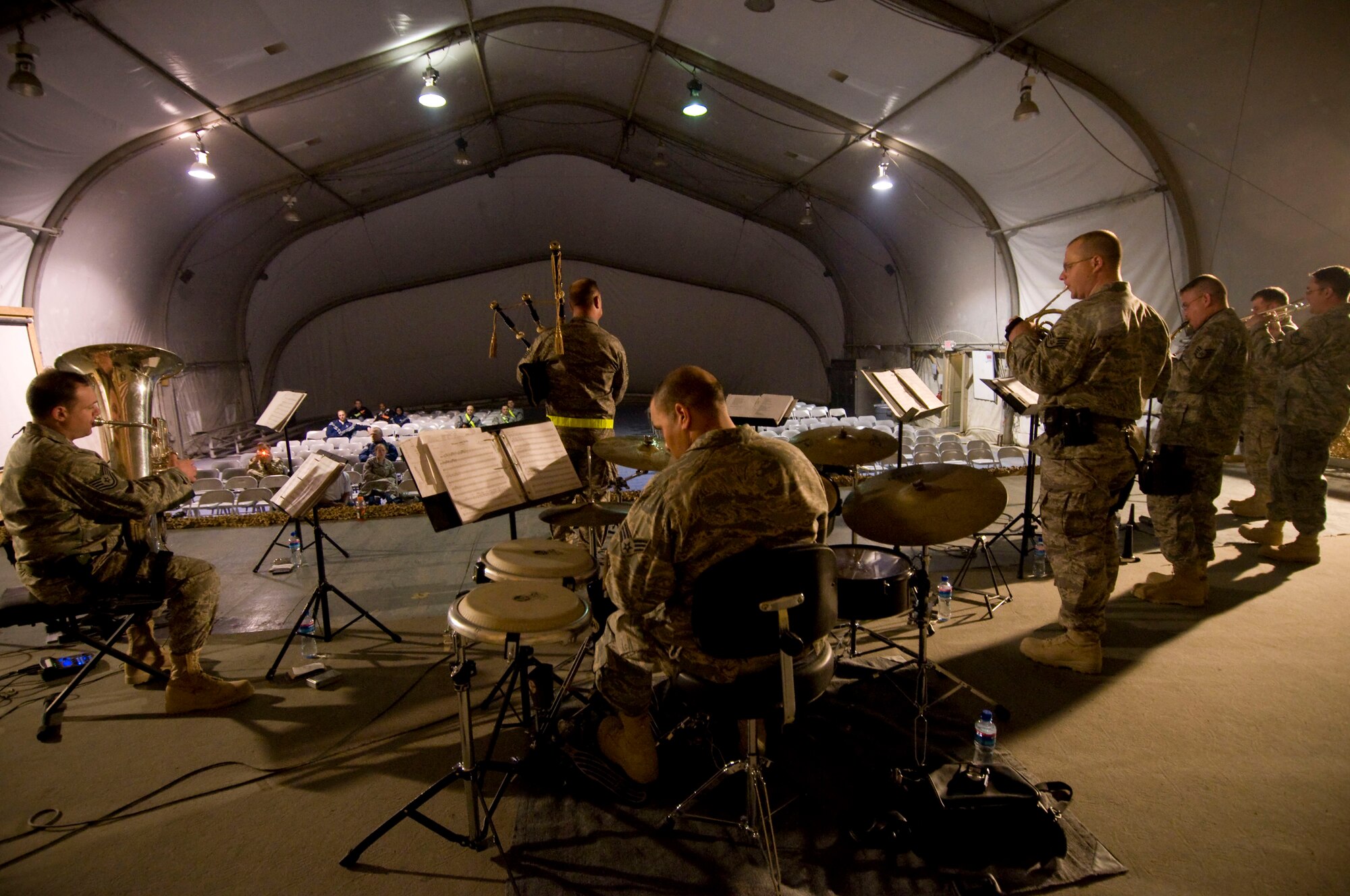 Air Forces Central band "Mojave" plays their feature performance at Bagram Air Field, Afghanistan, Dec. 27. They had a small turnout for the event, but Senior Airman Wilfredo Cruz said, "Even if we entertained one person, that's enough. We've done our job." (U.S. Air Force photo by Staff Sgt. Samuel Morse)(Released)