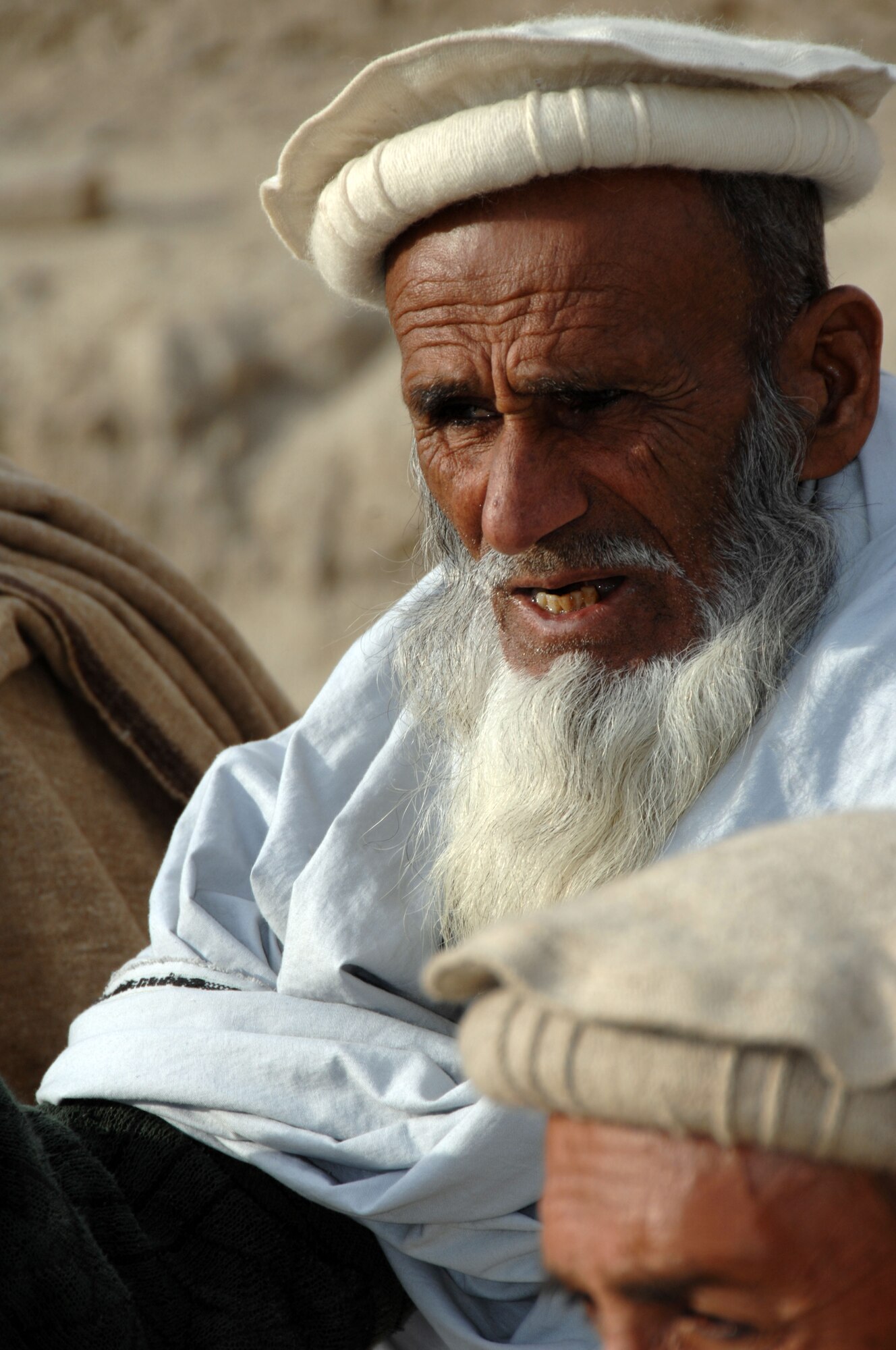 An Afghan village elder speaks with members of the Konar Provincial Reconstruction Team in Manawara District, Konar province, Afghanistan, Dec. 14. (U.S. army photo by Spc. Russell Gilchrest)(Released)