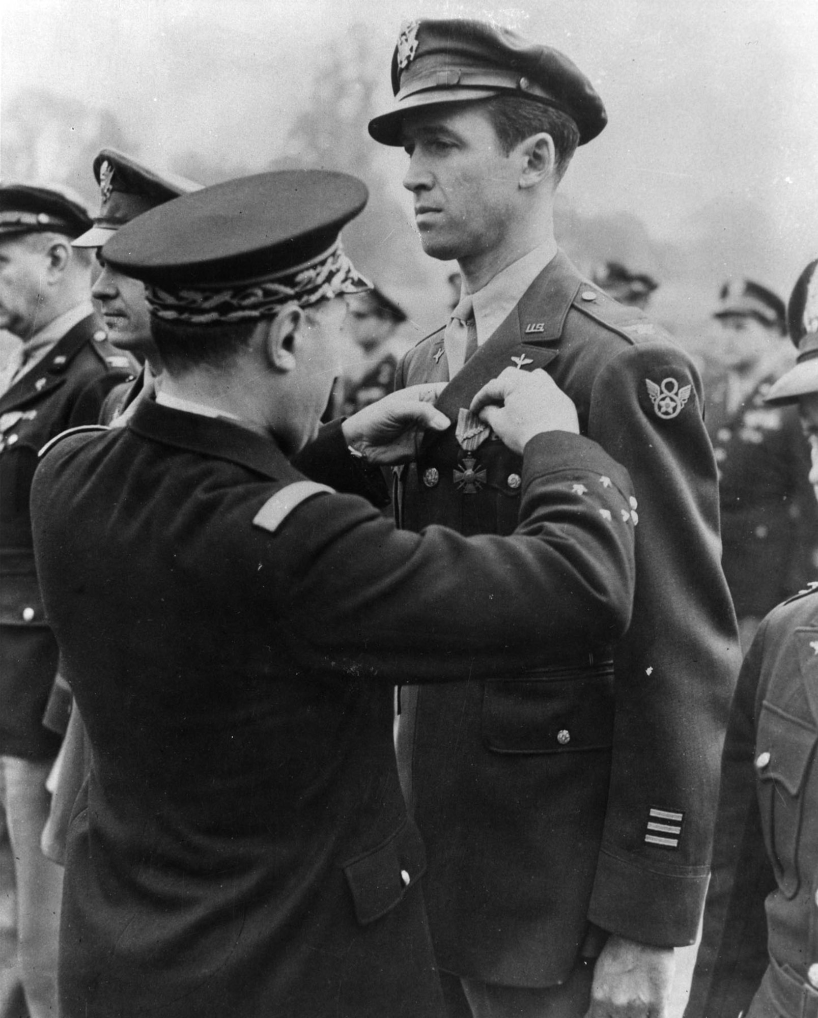 Lt. Gen. Valin, Chief of Staff, French Air Force, awards the Croix De Guerre with Palm to Col. Jimmy Stewart for exceptional services in the liberation. (U.S. Air Force photo)