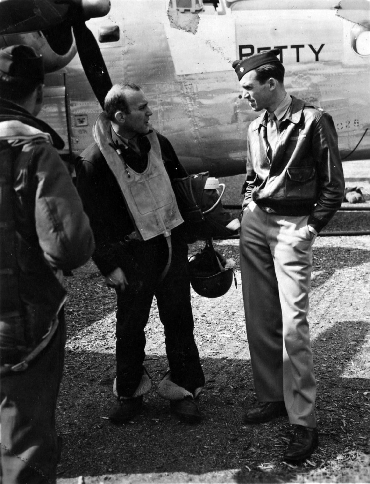 Maj. Jimmy Stewart confers with a B-24 crew member. (U.S. Air Force photo)