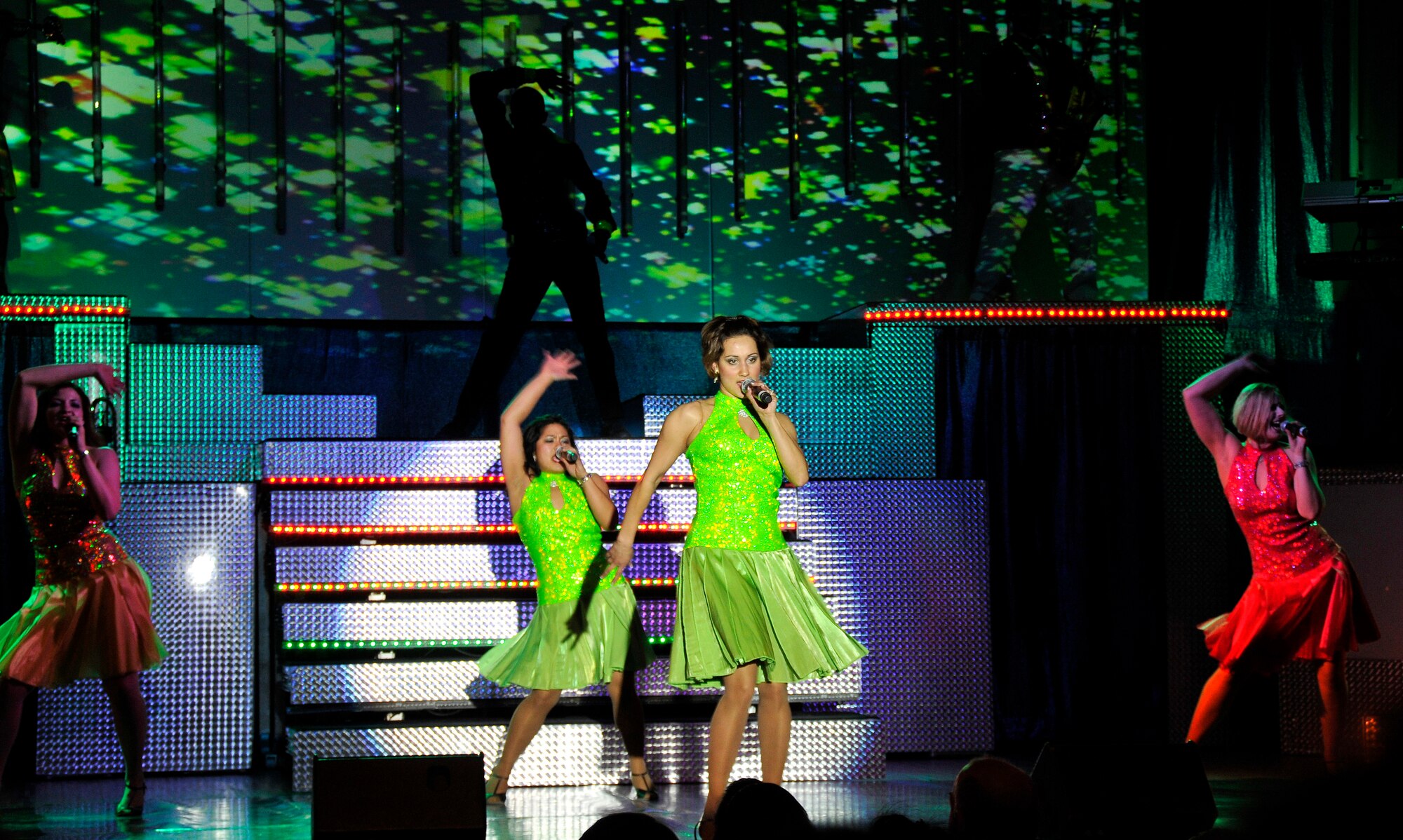 MISAWA AIR BASE, Japan -- Members of Tops in Blue perform onstage at
the Misawa Civic Center Dec. 29, 2008.  The group sang songs from a variety
of American movies and pop culture.  (U.S. Air Force photo by Senior Airman
Chad Strohmeyer)
