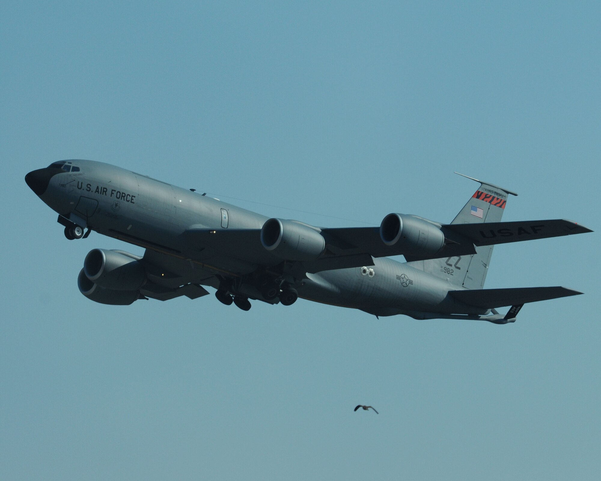 YOKOTA AIR BASE, Japan -- A KC- 135 Stratotanker, an aerial refueling aircraft, retracts its landing gear after doing a touch-and-go on the flightline here Dec. 30. The aircraft is assigned to the 909th Air Refueling Squadron, Kadena Air Base, Japan. (U.S. Air Force photo by Senior Airman Brian Kimball)