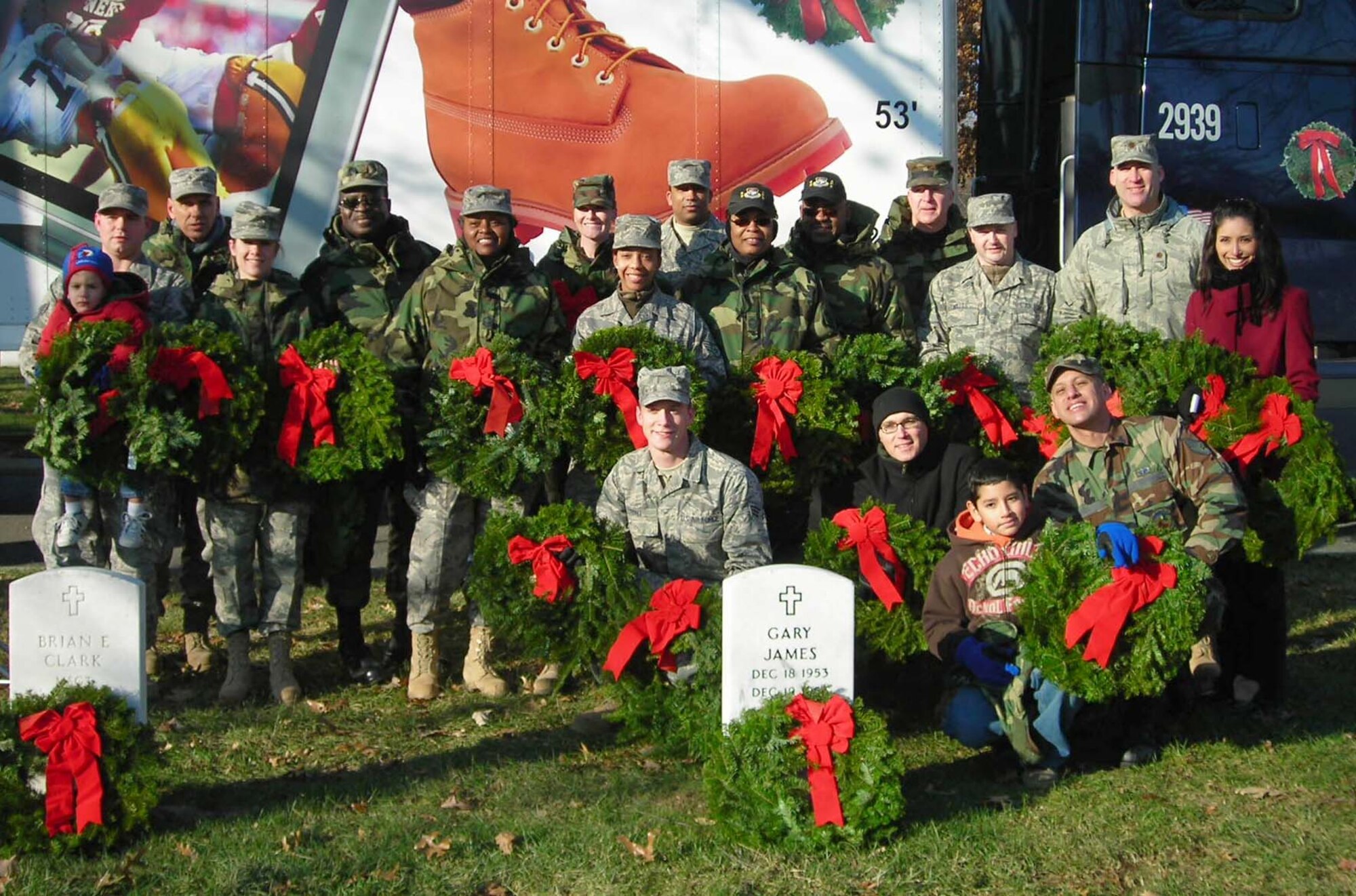 Members of the 69th Aerial Port Squadron and their families gathered at Arlington National Cemetery Dec. 13 to take part in 17th annual "Wreaths Across America" ceremony.  Across the United States, ceremonies took place in more than 200 other national and state veterans' cemeteries remembering, honoring and teaching about the service and sacrifices of the nations fallen heroes.  