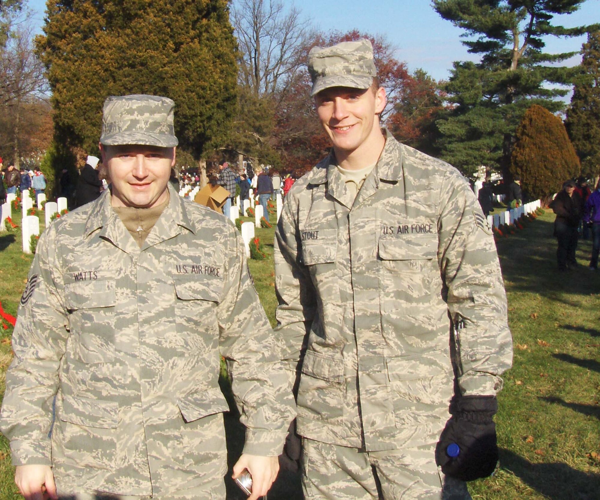 Tech Sgt. James Watts, Air Transportation Craftsman and Senior Airman Patrick Stout, Air Transportation Journeyman, both of the 69th Aerial Port Squadron gathered at Arlington National Cemetery on Dec. 13 for the Wreaths Across America ceremony to remember, honor and teach about the service and sacrifices of the nations fallen heroes.  Wreaths Across America ceremonies took place in more than 200 other national and state veterans' cemeteries across the United States.