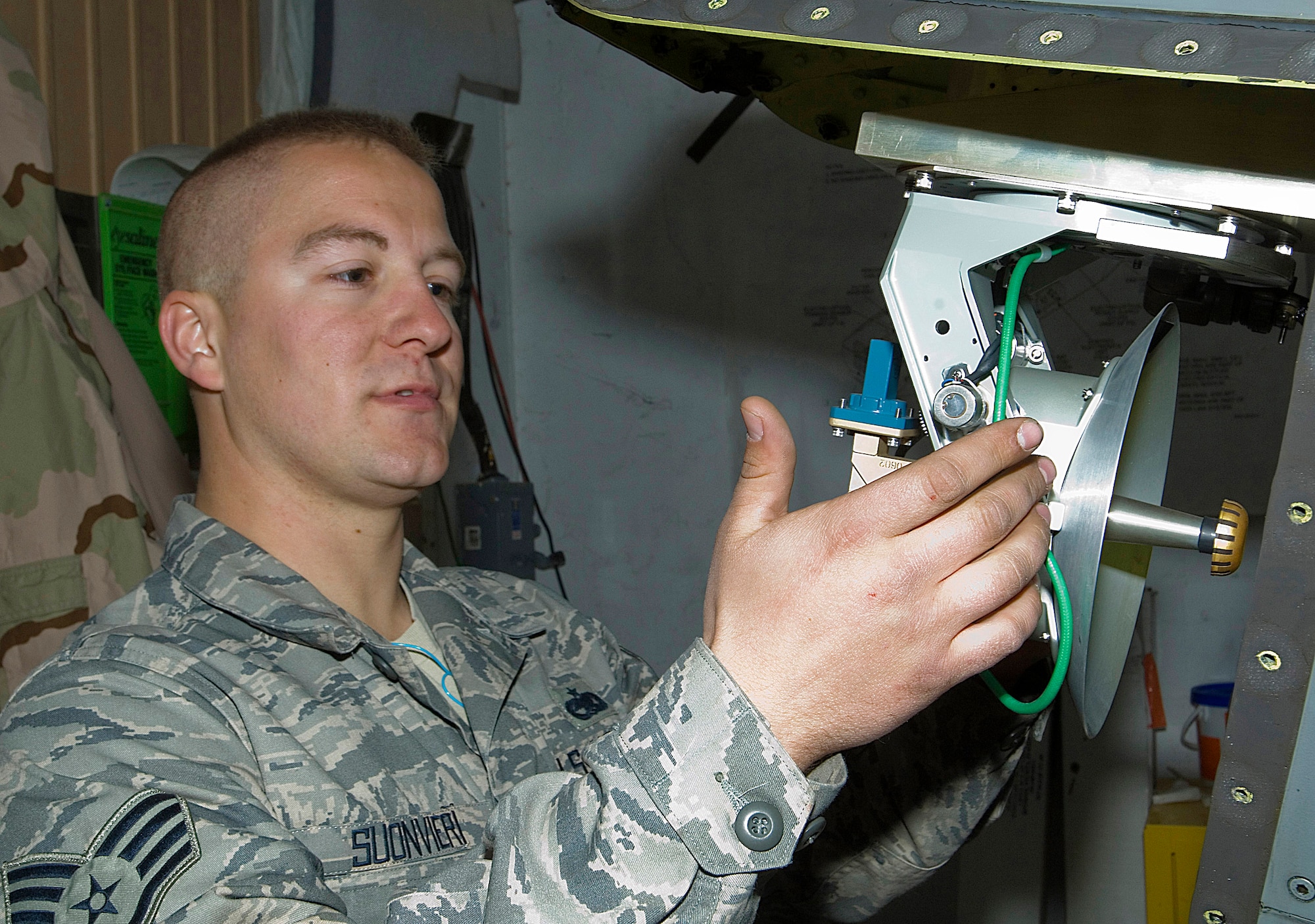 Staff Sgt. George Suonvieri checks the connections on a Theater Airborne Reconnaissance System pod mounted on an F-16 Fighting Falcon Dec. 21 at Joint Base Balad, Iraq. Ground commanders use TARS imagery to achieve their tactical objectives. Sergeant Suonvieri is one of four 332nd Expeditionary Aircraft Maintenance Squadron avionics maintainers responsible for the 332nd Expeditionary Fighter Squadron's TARS pods. Sergeant Suonvieri, a native of Duluth, Minn., is deployed from the Minnesota Air National Guard's 148th Fighter Wing. (U.S. Air Force photo/Tech. Sgt. Erik Gudmundson)