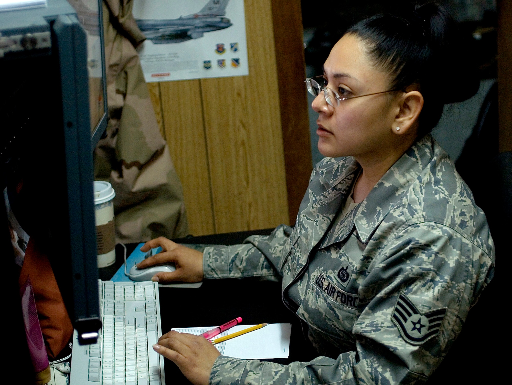 Staff Sgt. Alma Torres, an imagery analyst with the 332nd Expeditionary Operations Support Squadron at Joint Base Balad, Iraq, supplies decision makers with imagery intelligence.  Theater Airborne Reconnaissance System imagery helps ground commanders achieve tactical objectives. Sergeant Torres, deployed from the 24th Intelligence Squadron at Ramstein Air Base, Germany, is a native of Miles, Texas. (U.S. Air Force photo/Tech. Sgt. Erik Gudmundson)