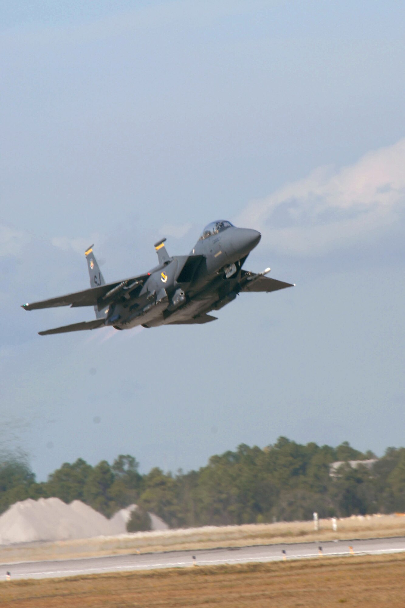 Aviators from the 336th Fighter Squadron take off on a training sortie in an F-15E Strike Eagle at Tyndall Air Force Base, Fla., Dec. 18. The 336th FS and associated maintenance personnel completed the two-week air-to-air combat evaluation called Combat Archer Dec. 19. (U.S. Air Force photo by Staff Sgt. Shawn J. Jones)