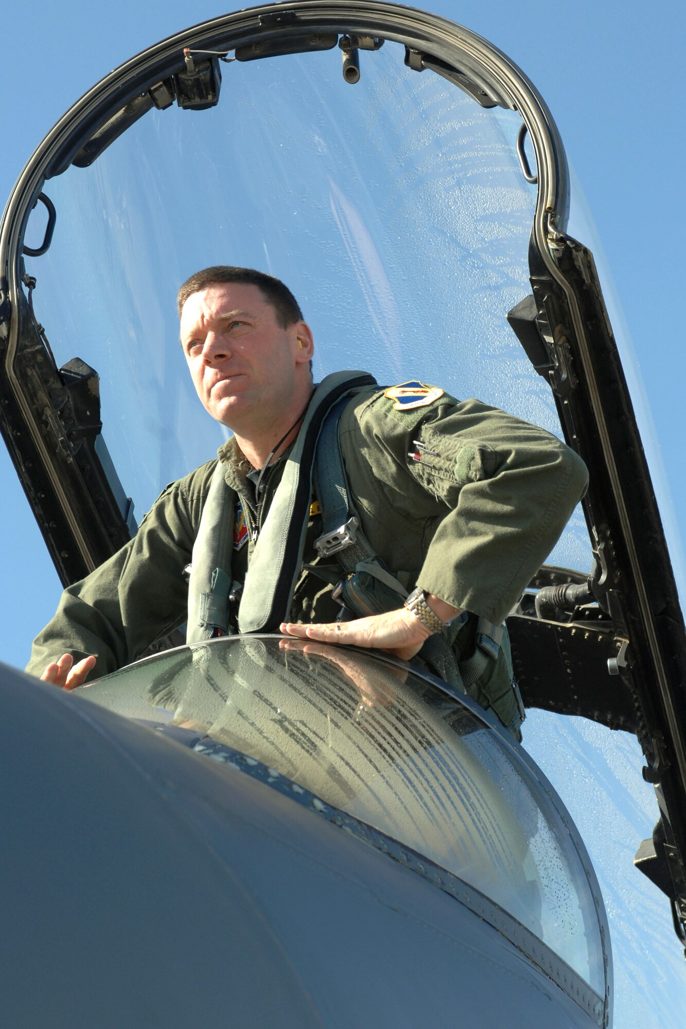 Lt. Col. Michael Eltz, 336th Fighter Squadron director of operations, climbs into an F-15E Strike Eagle prior to a training sortie at Tyndall Air Force Base, Fla., Dec. 18. The 336th FS and associated maintenance personnel completed the two-week air-to-air combat evaluation called Combat Archer Dec. 19. (U.S. Air Force photo by Staff Sgt. Shawn J. Jones)