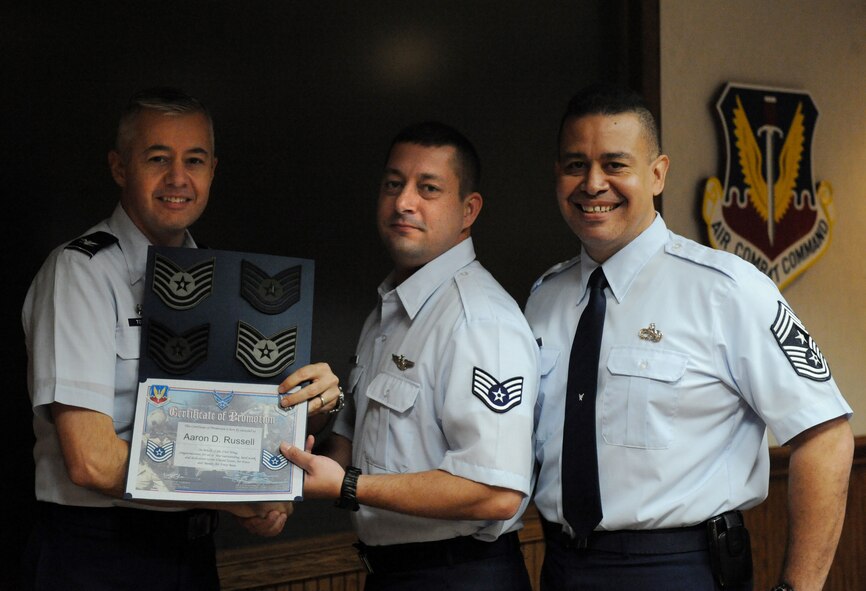MOODY AIR FORCE BASE, Ga. – Staff Sgt. Aaron Russell, 347th Rescue Group, is promoted to technical sergeant by Col. Kenneth Todorov, 23rd Wing commander, and Chief Master Sgt. Paul Burgess, 23rd Wing command chief, under the Stripes for Exceptional Performers program here Dec. 29. (U.S. Air Force photo by Senior Airman Gina Chiaverotti) 