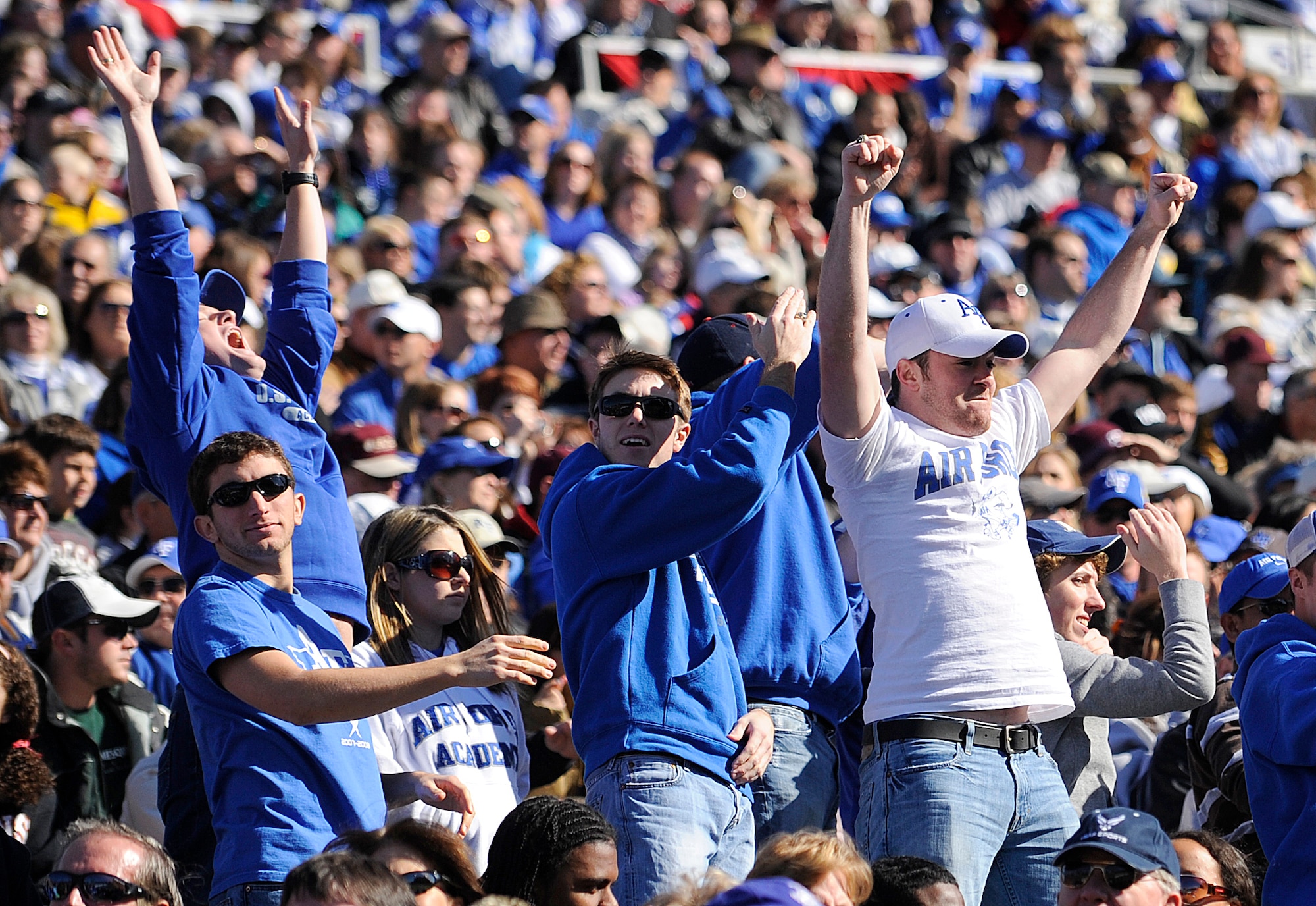 Falcon fans celebrate a touchdown during the Bell Helicopter Armed Forces Bowl game between the U.S. Air Force Academy Falcons and the University of Houston Cougars Dec. 31 at Amon G. Carter Stadium, Fort Worth, Texas. (U.S. Air Force photo/Staff Sgt. Bennie J. Davis III)