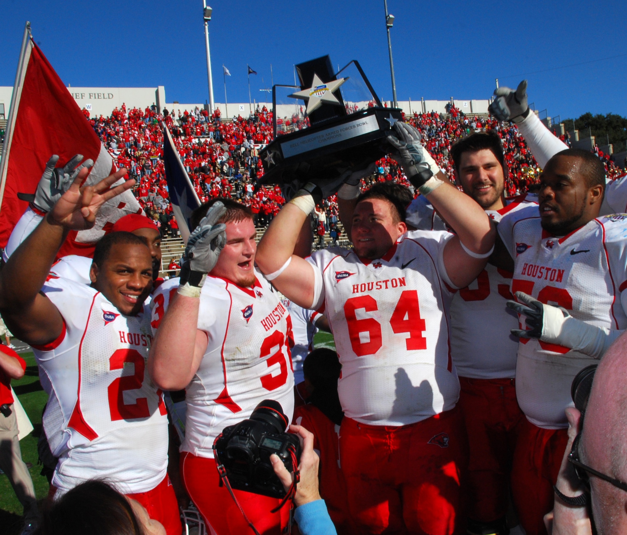 University of Houston cougars reveled in the glory as the new Armed Forces Bowl champions. Houston beat the Air Force Academy, 34 to 28 at Fort Worth's Amon Carter Stadium on New Year's Eve. (U. S. Air Force Photo/Tech. Sgt. Julie Briden-Garcia)
