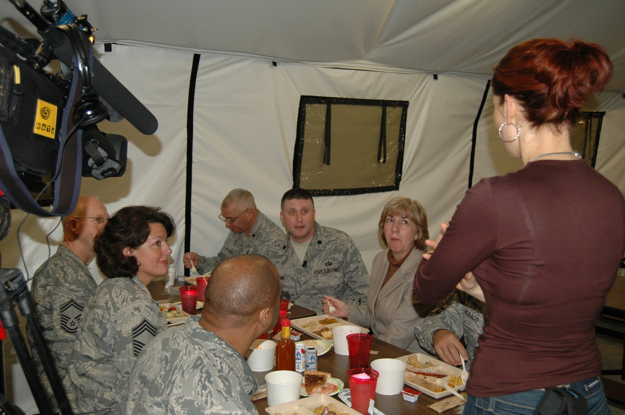 CBS46 TV reporter Dagmar Midcap interviews Dobbins ARB personnel about their deployment experience and the Christmas meal served at the combat dining facility.  (U.S. Air Force photo/Master Sgt. Stan Coleman)