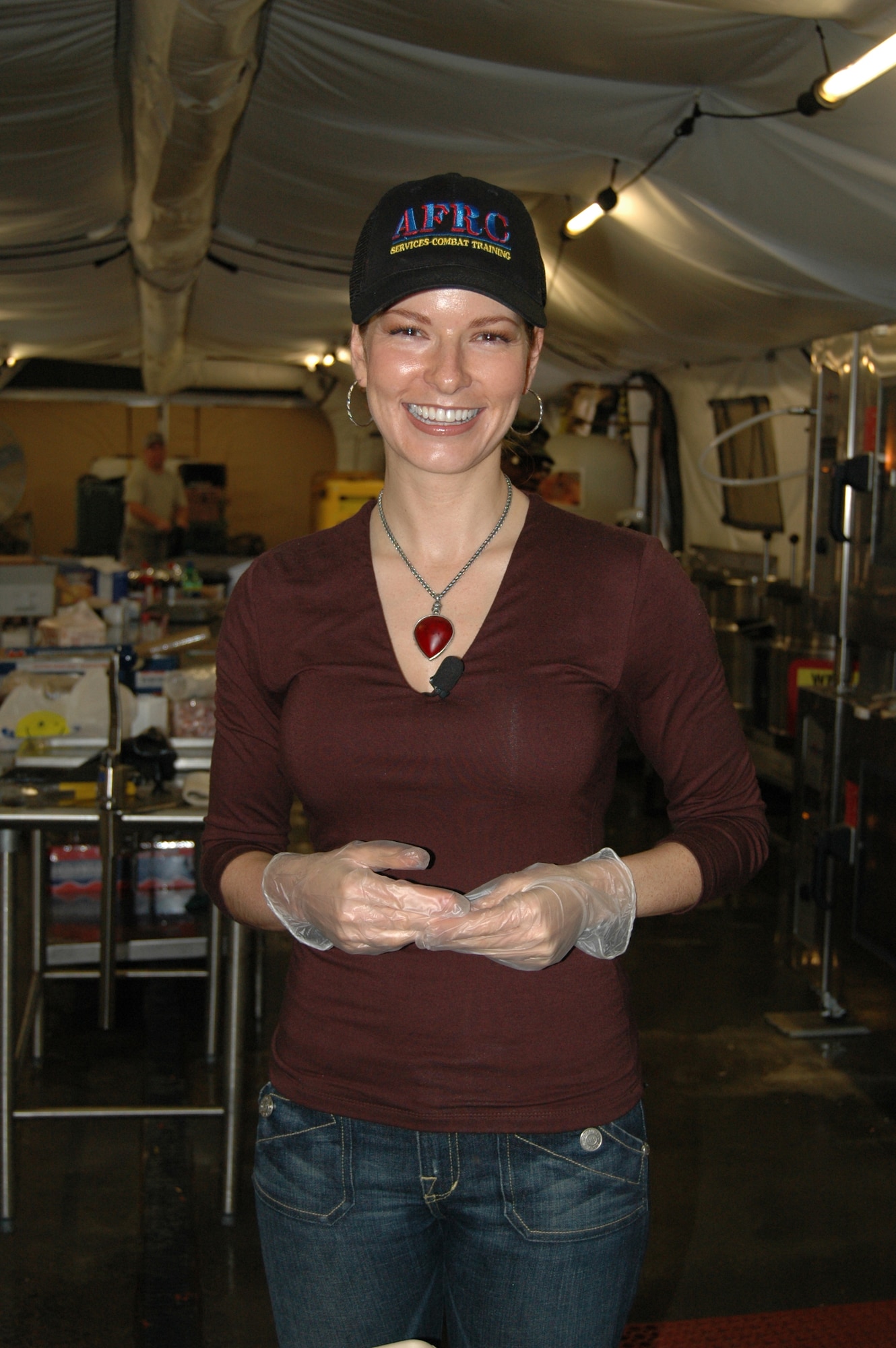 Prepped and ready. CBS46 TV reporter Dagmar Midcap is ready to serve at the chow hall line at the Air Force Reserve Command Services Combat Training Center at Dobbins Air Reserve Base Dec 11.  CBS46 aired a story on the Christmas meal that was prepared by the instructors at the Combat Services kitchen.  (U.S. Air Force photo/Master Sgt. Stan Coleman) 